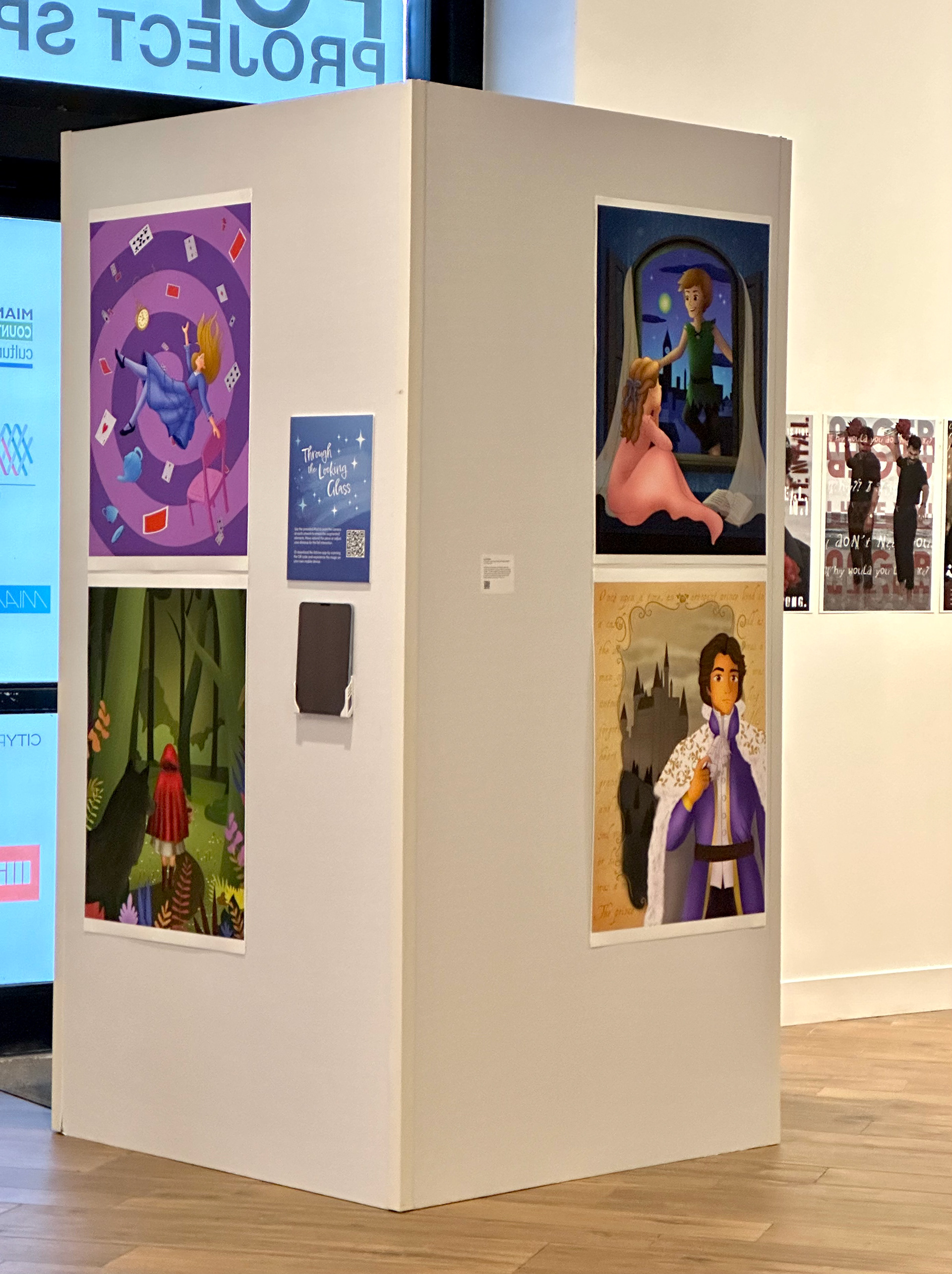 Installation view of Through the Looking Glass at FIU’s Rhizome 2024 BFA Digital Arts/Design