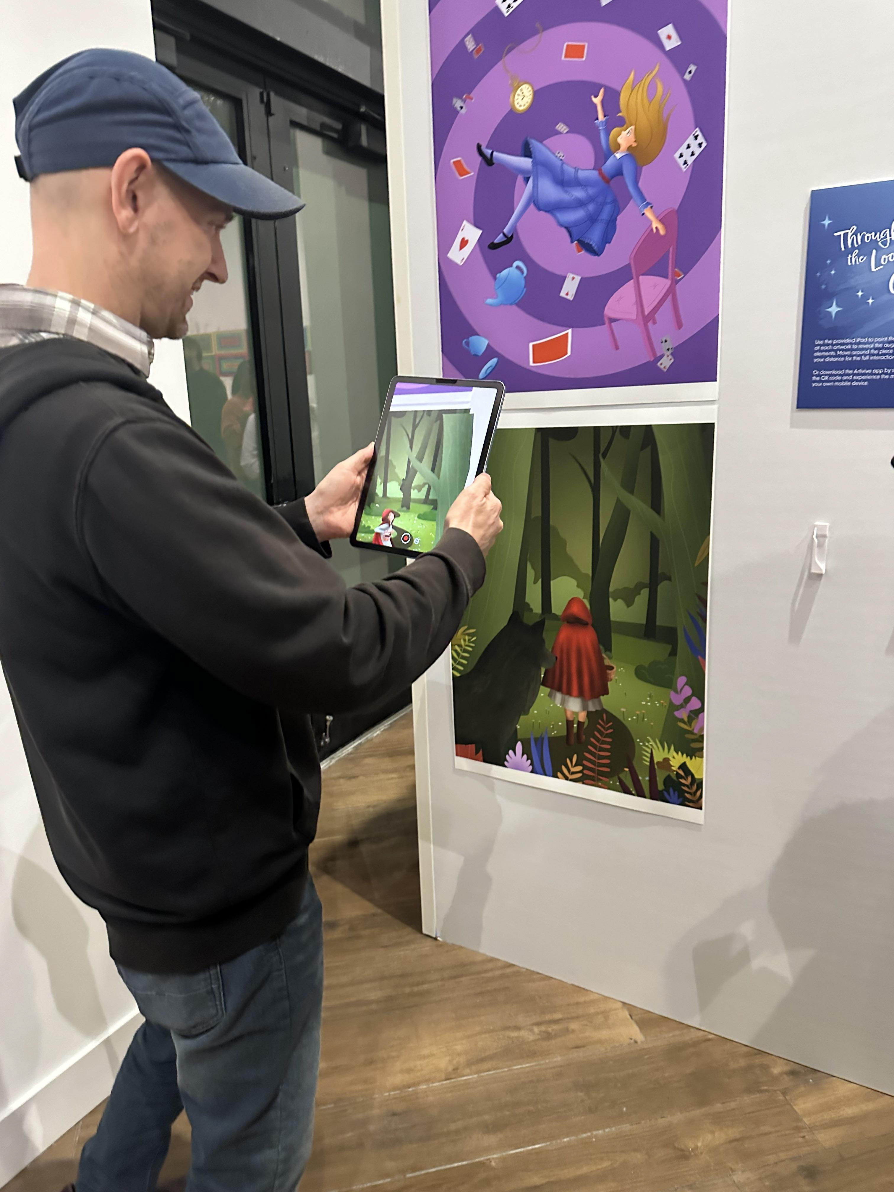 Visitors interacting with the series and exploring the augmented layers.