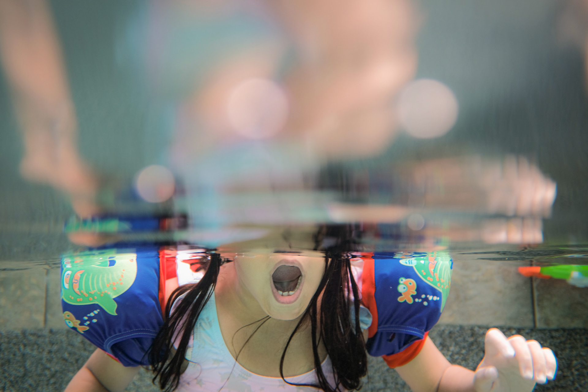 Can you open your mouth underwater?