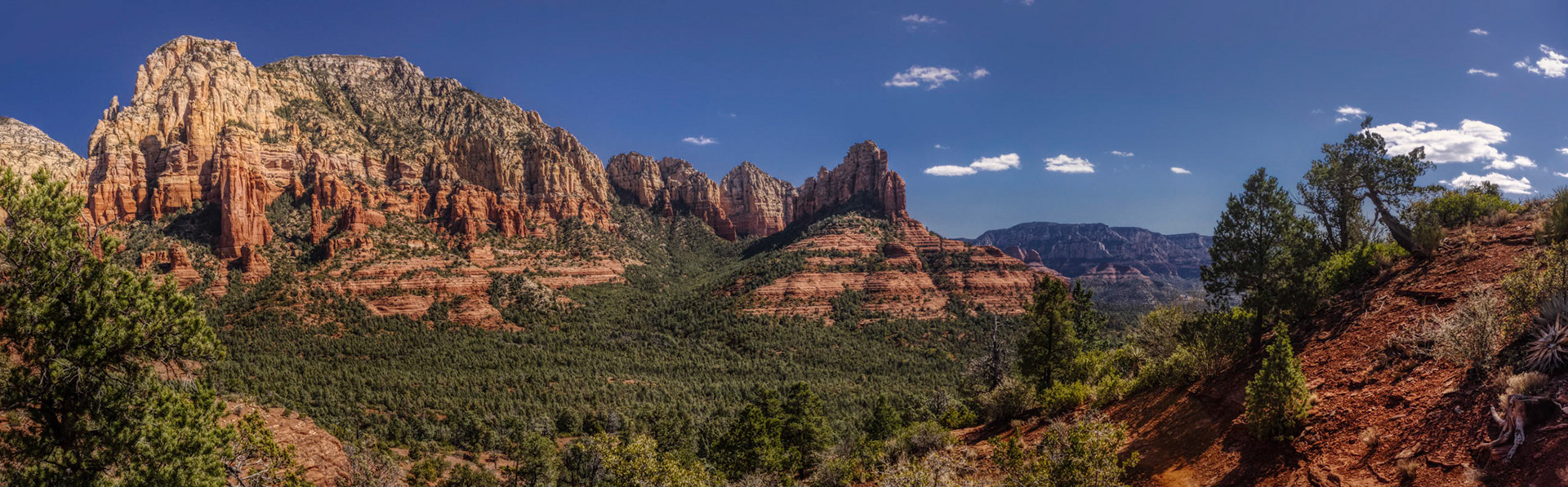 Colorful Mormon Canyon Panorama viewed from along the Brins Mesa Trail on a clear, sunny day in the Coconino National Forest, Arizona