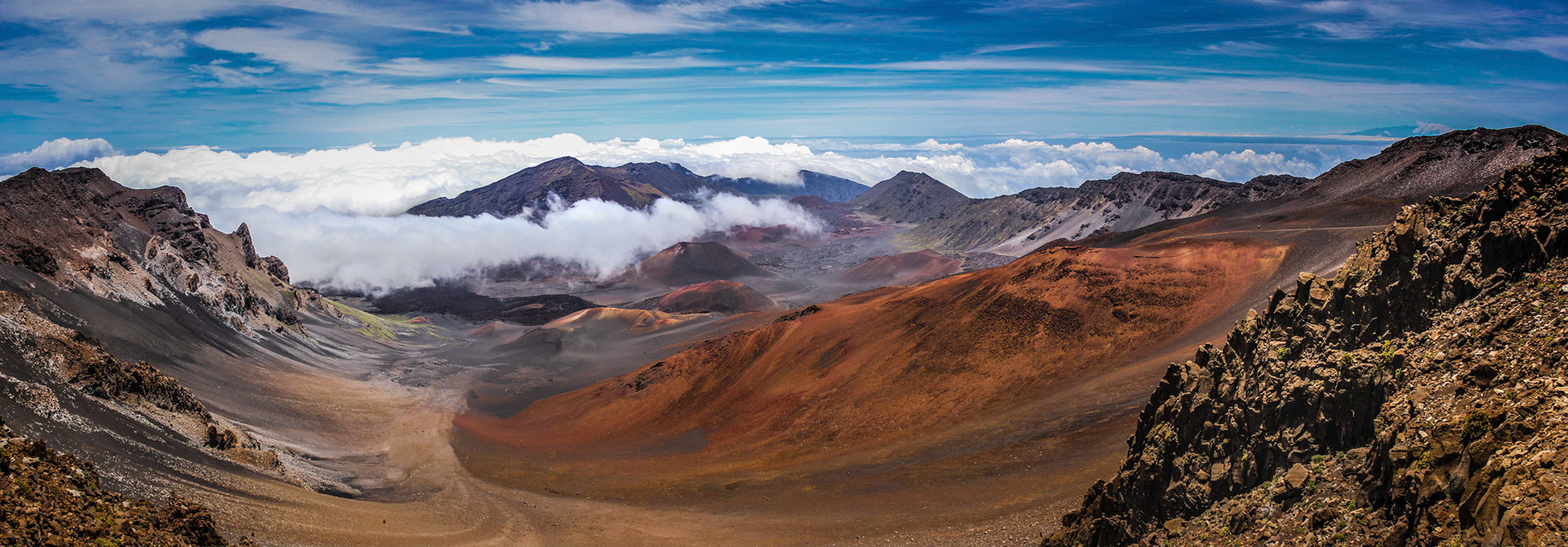 Colorful panoramic view of volcanic cones from the peak of the Haleakala Crater in Maui, Hawaii