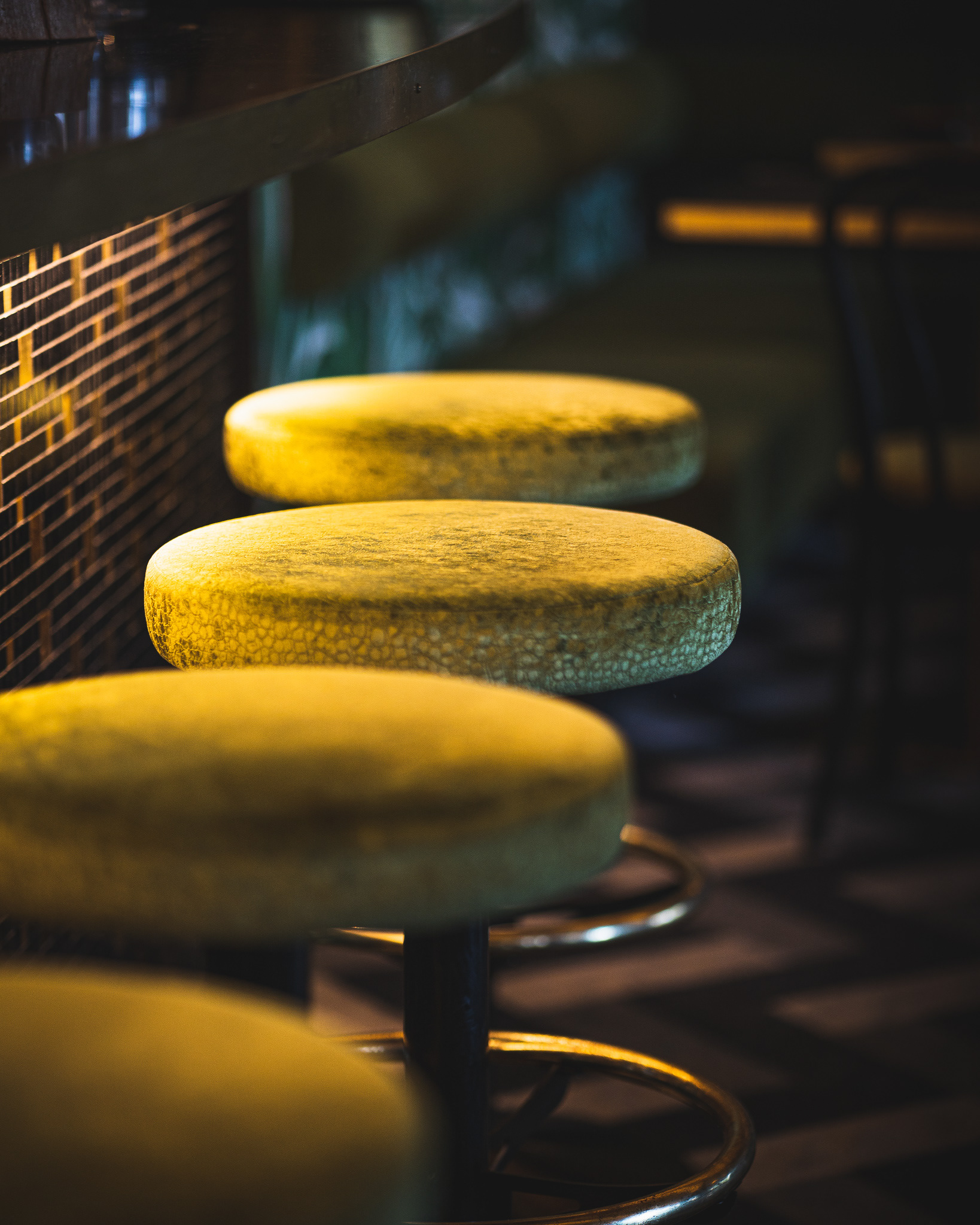 An image of bar stools with depth blur