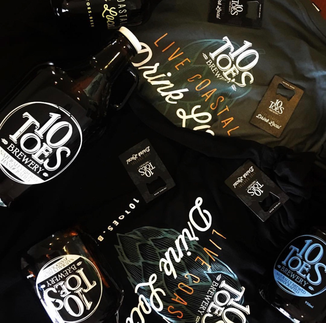 10 Toes Brewery branded merchandise featuring bottle openers, t-shirts and growlers