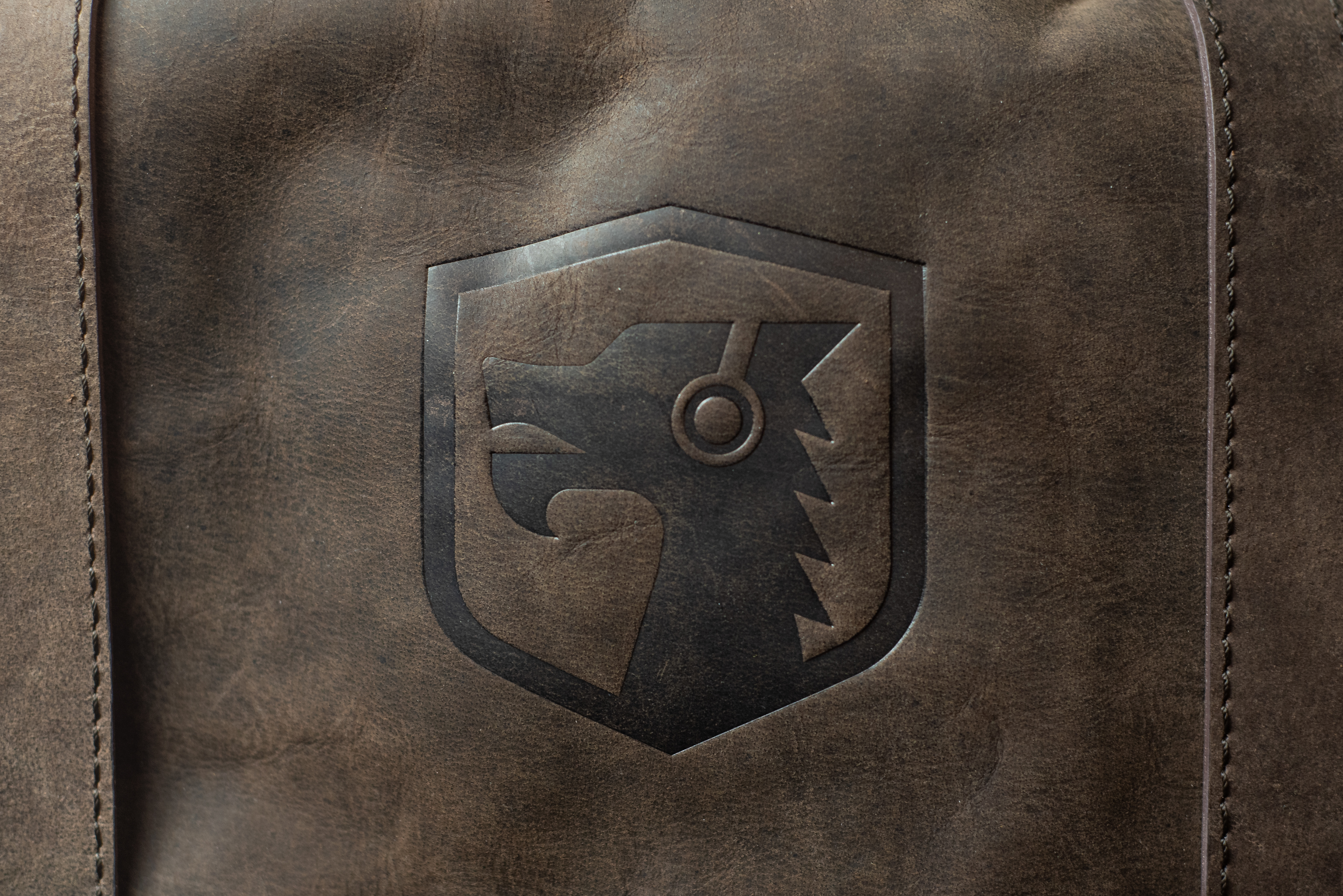 Debossed logo on backpack