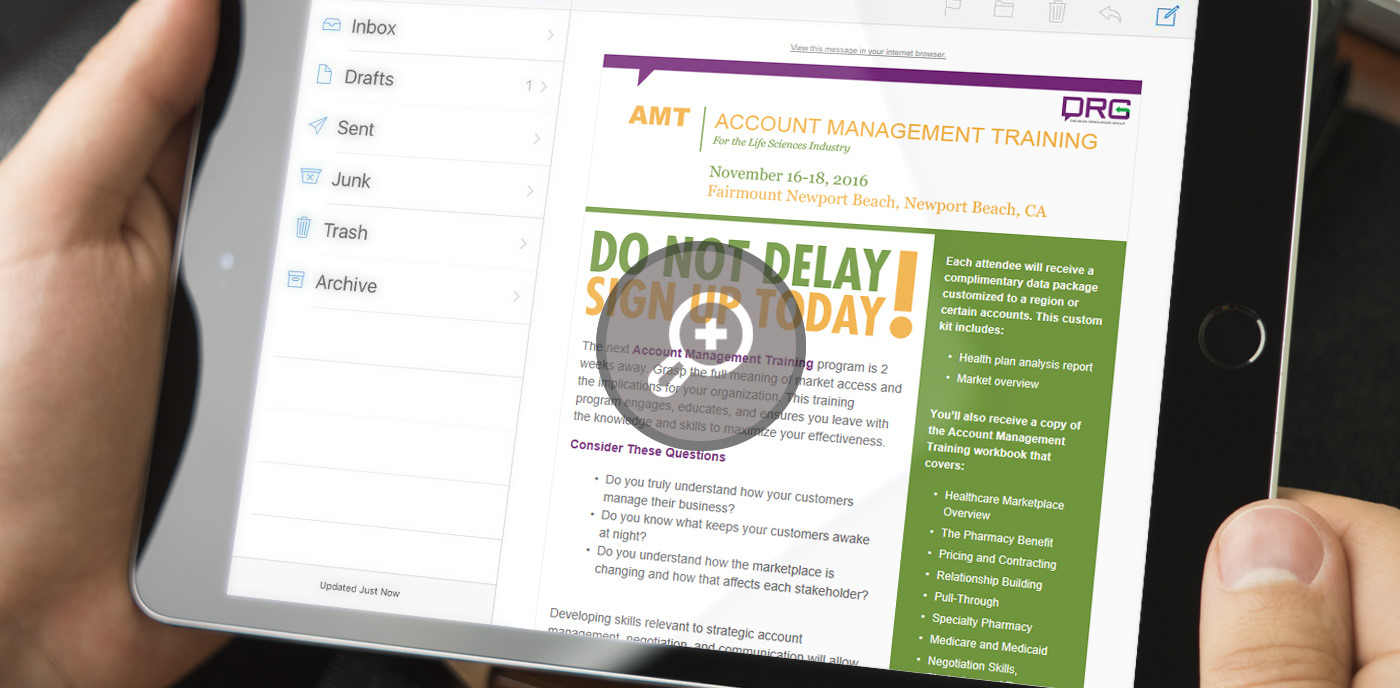 Example DRG screenshot of email on iPad with two hands holding