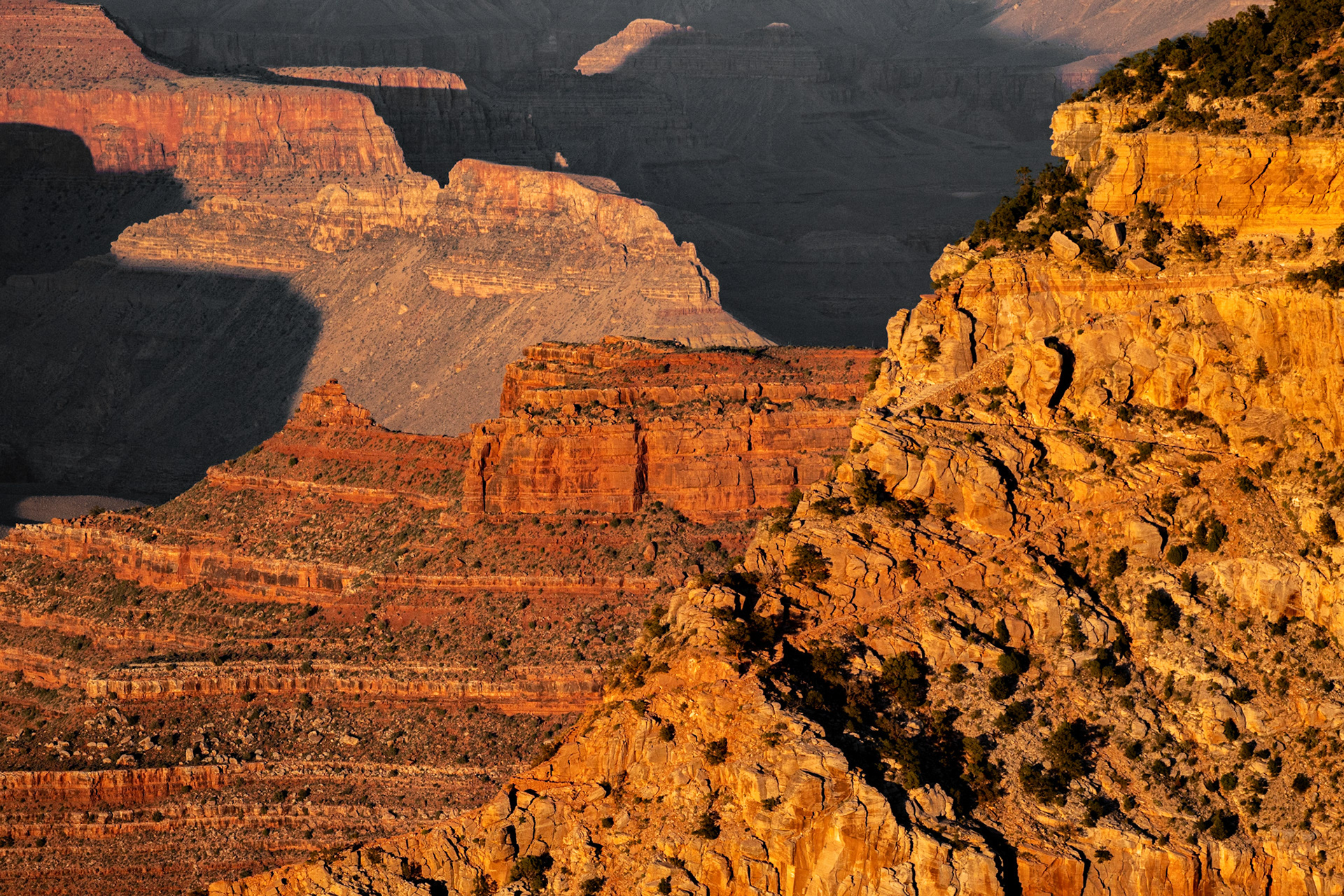 Gold plating of the red rocks during sunset