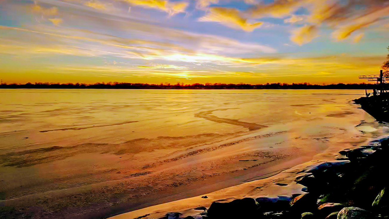 Sunset in Narnia: Departing Sun over frozen Lake Lansing (Haslett, MI)