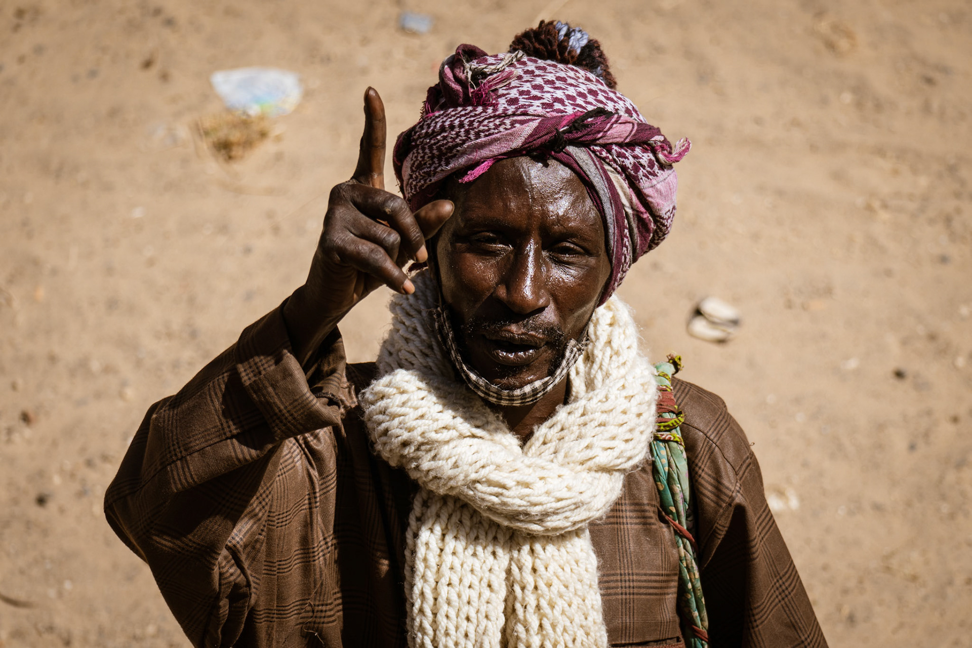 portrait of an old man raising his finger (Senegal, Dakar)