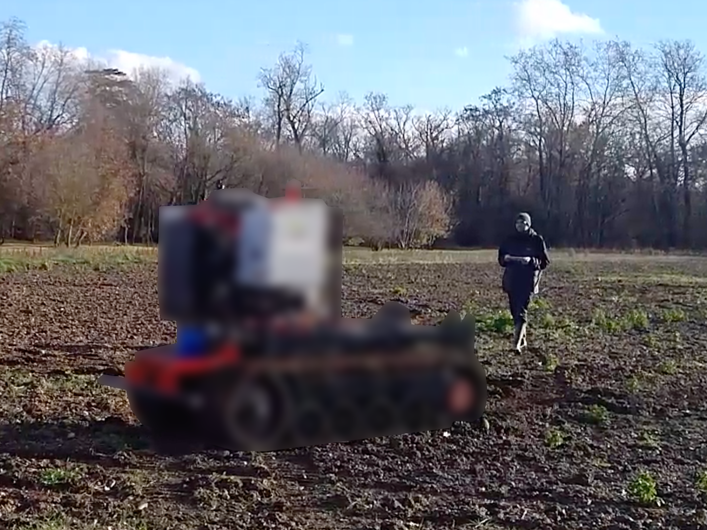 operator running after the robot