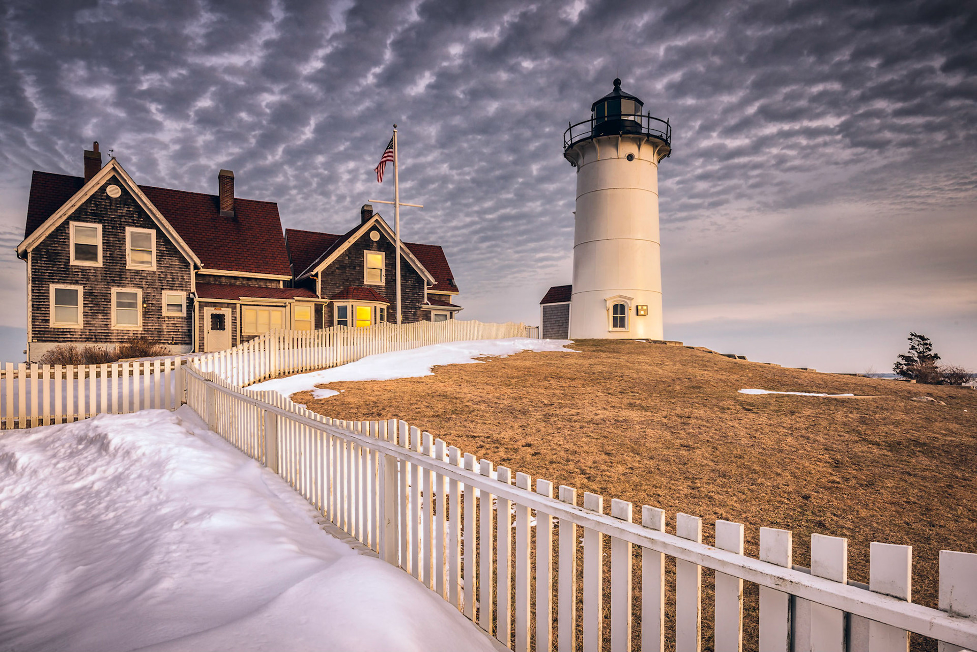 The fridgid wind stops, A moment of clarity, As Old Glory rests