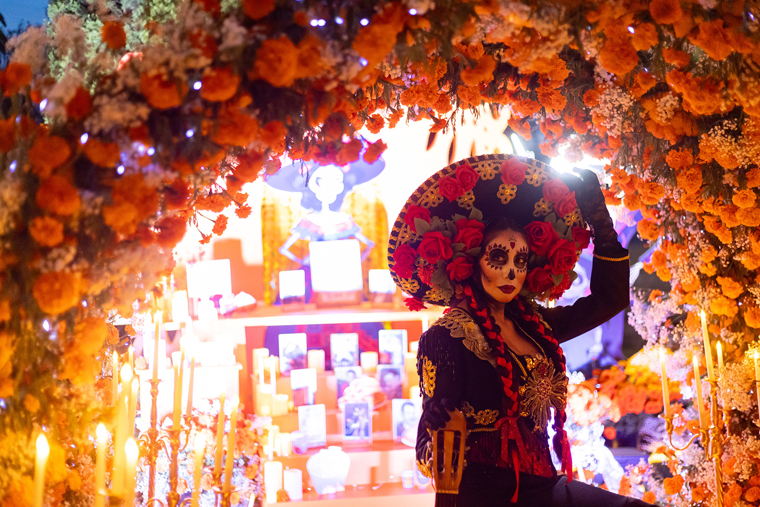 Paulina Herrera, fashion designer of Paulina Clothing, dedicates her outfit to her late father, who always wanted to see her in a Mariachi suit. Herrera hosts an annual tour, visiting 25 cities in the U.S. and Mexico, giving people catrina makeovers and photoshoots.