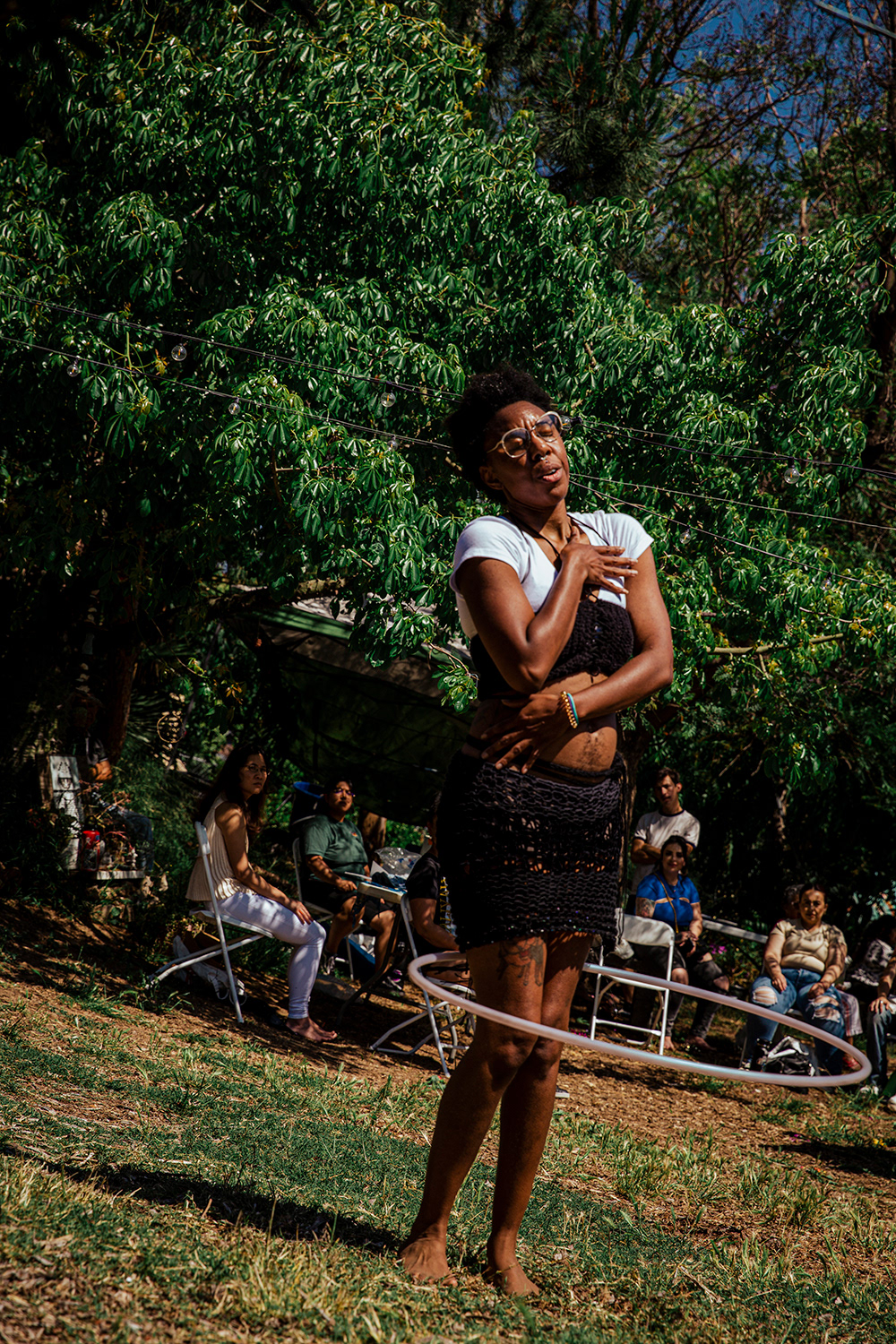 Ginger Alleyne performs a hula hoop dance at Well:spring.