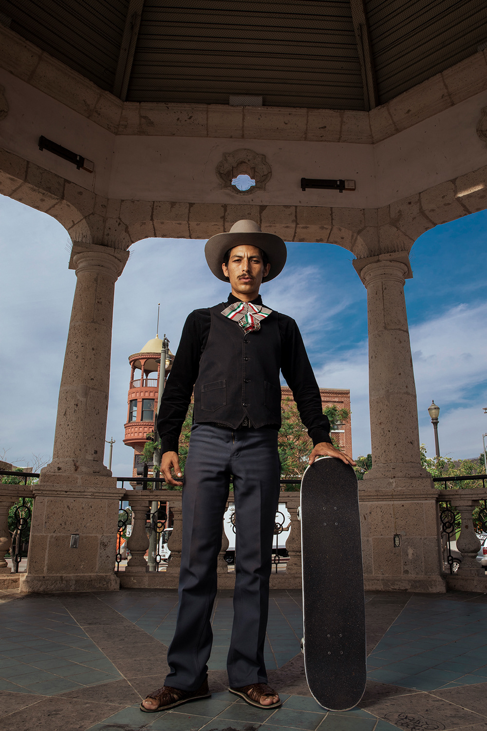 “There is no way to dress as a skateboarder,” said Steve Corona. “I’ve gone through different styles to find this one.” Corona poses with his skateboard at Mariachi Plaza in Boyle Heights on September 22, 2023.