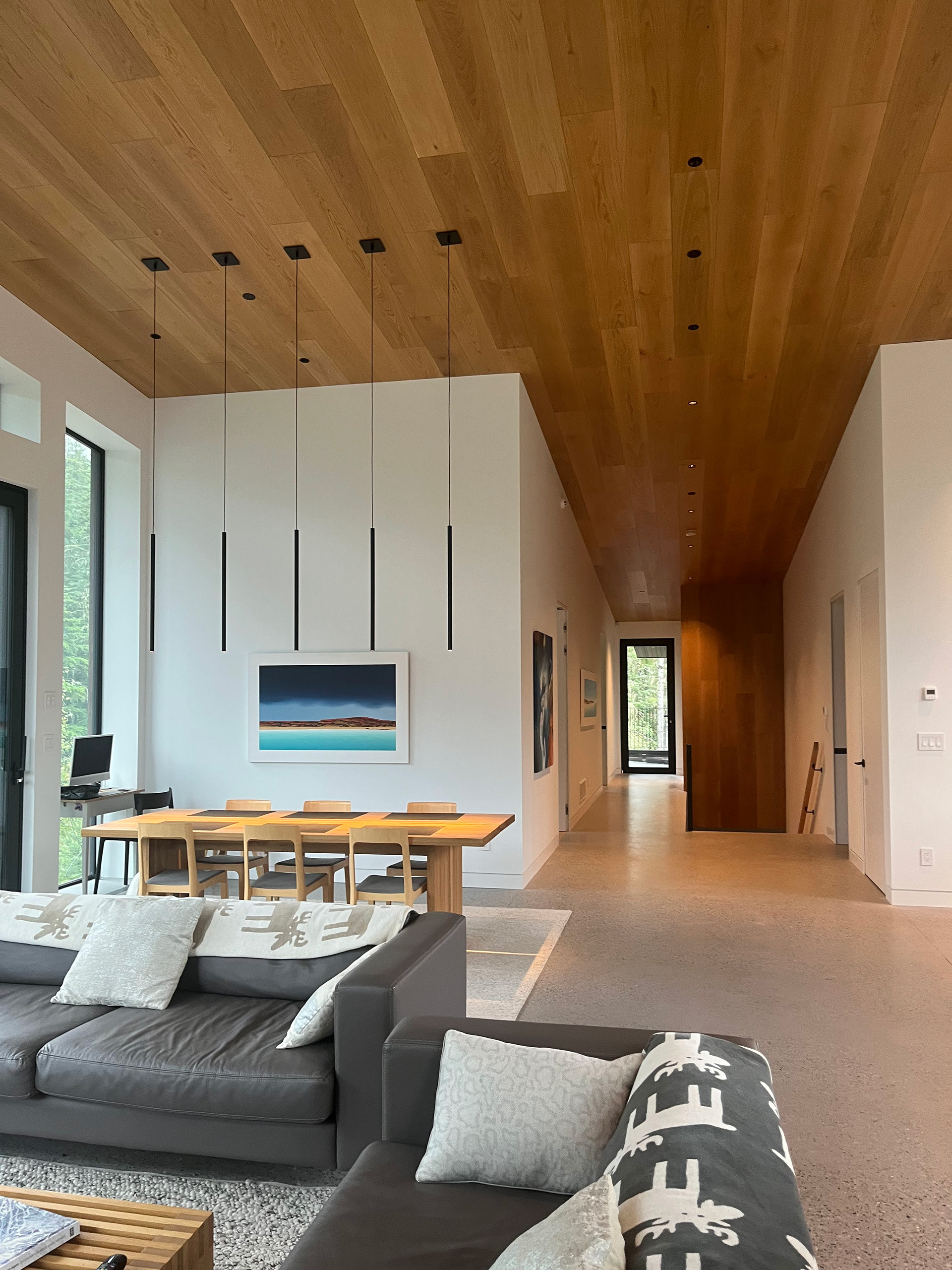 High Ceilings and Polished Concrete Floor in Living Room