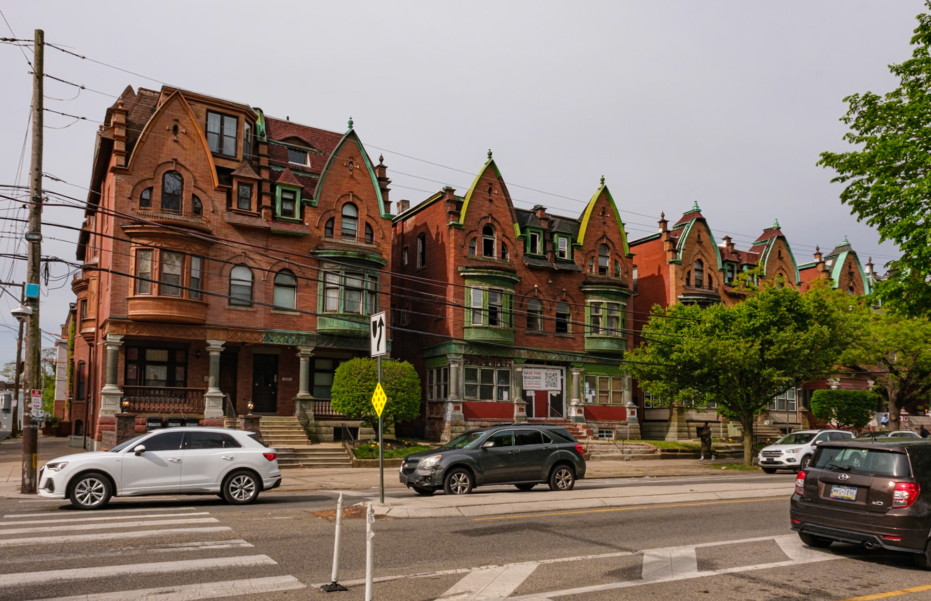 Parkside Homes with Gothic Style Fronts Including Home in Need of Rehab