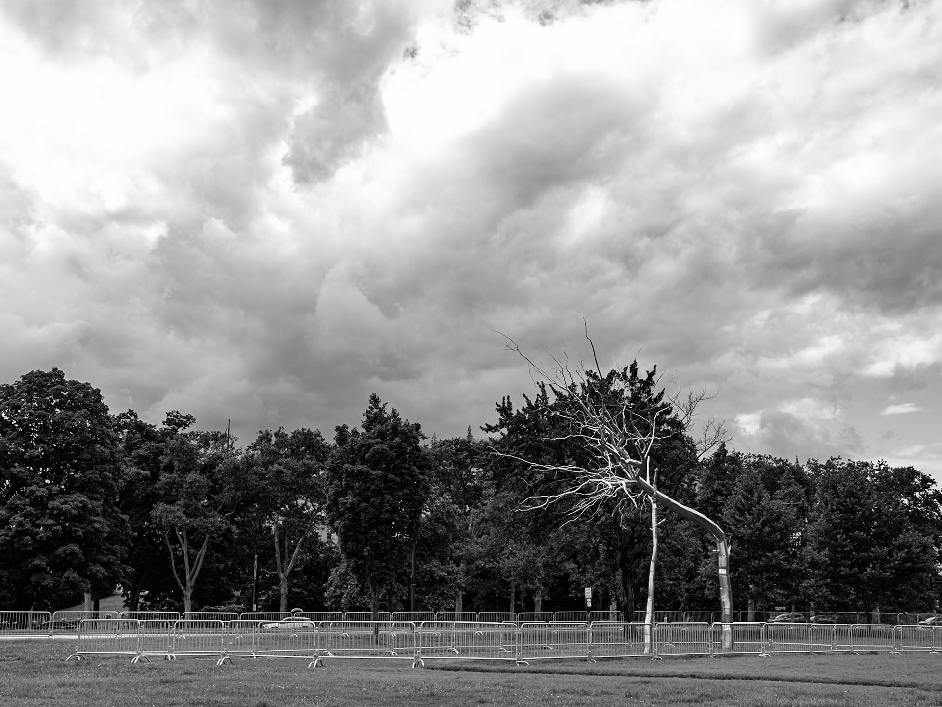 Silver Sculpture in Black and White on a Cloudy Interval August 2026