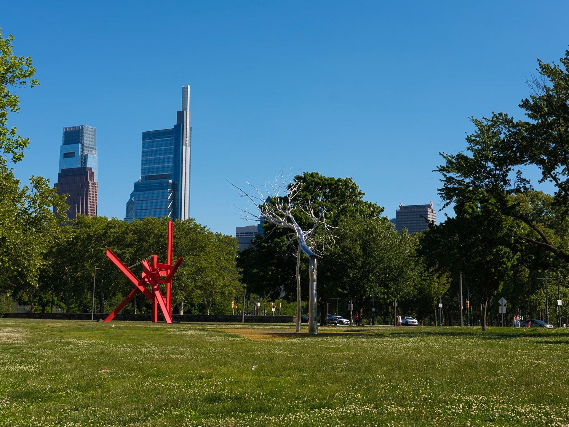 Steel Sculpture and Silver Work Near Art Museum in May During Late Afternoon