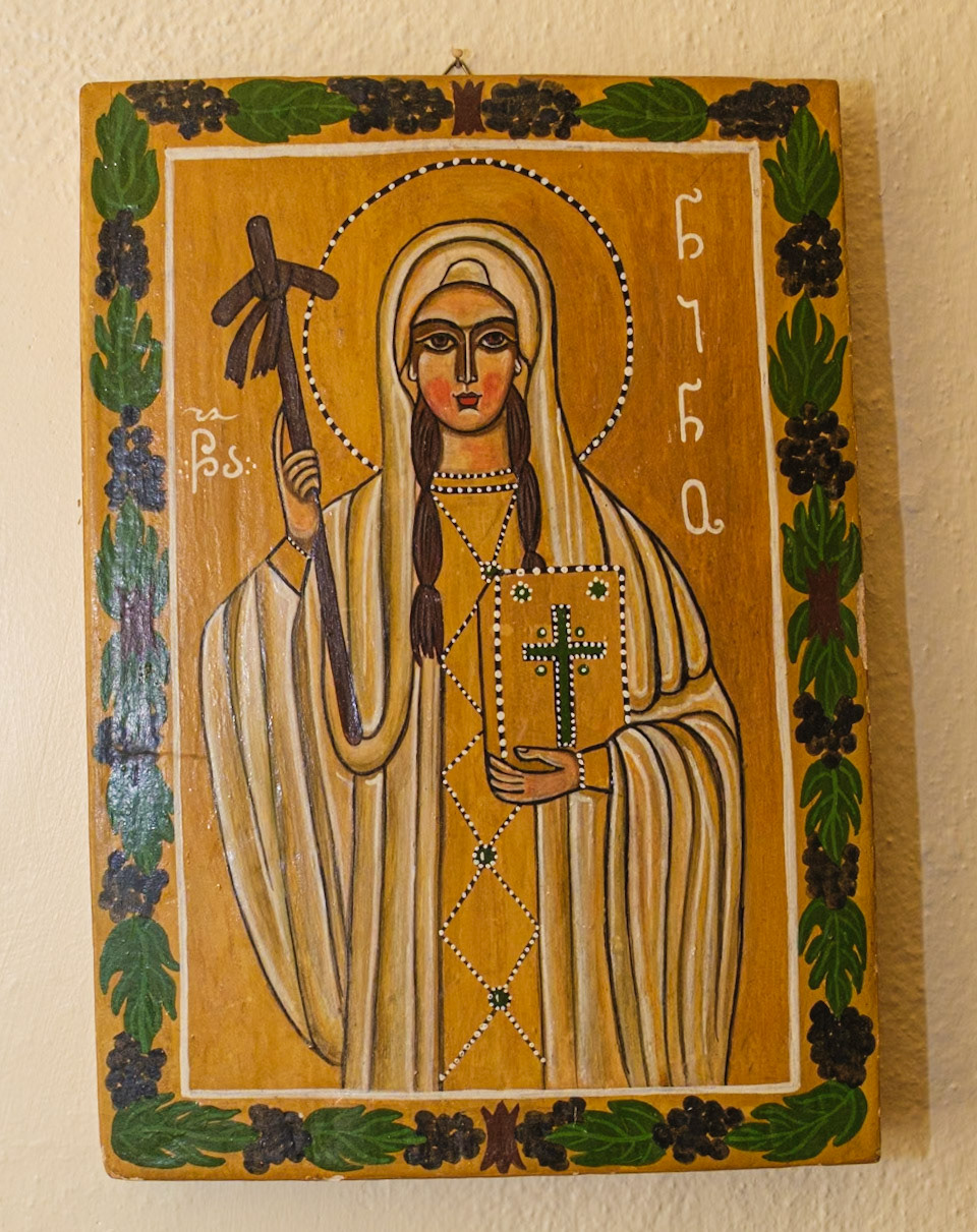 Robed Saint with Cross and Scripture Book