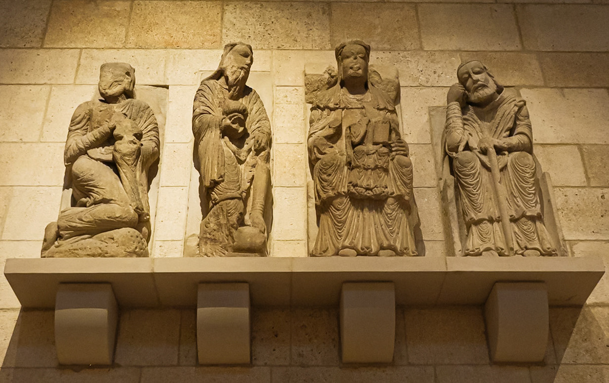 Four Figures on a Shelf the Cloisters July 2024