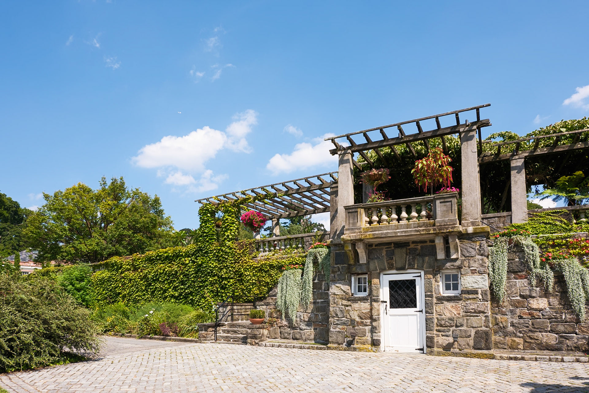Hanging Trellis and Stone Workroom Entrance at Wave Hill August 2024
