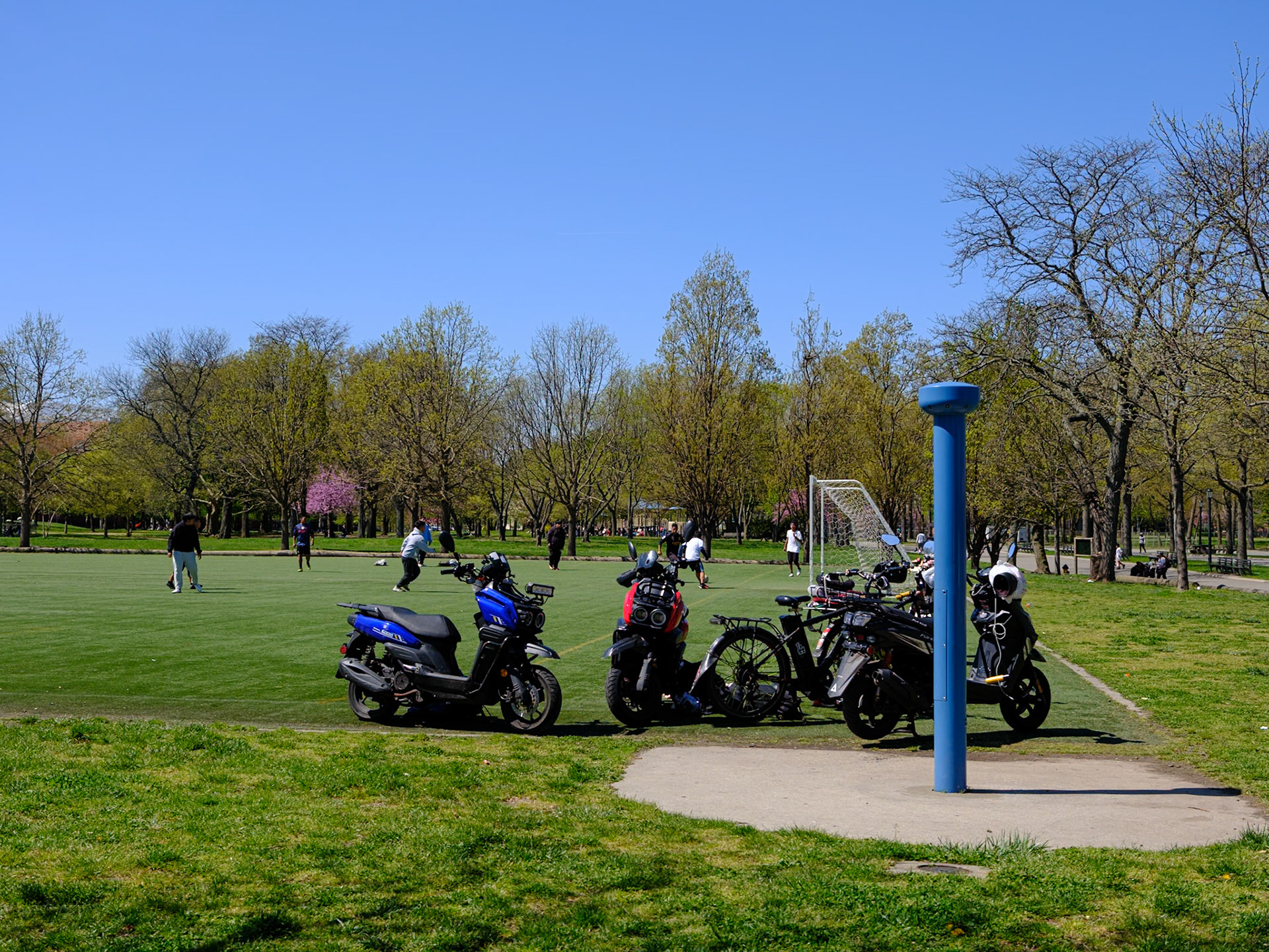 Parked Motorcycles at Soccer Field Flushing Meadows Corona Park April 2024
