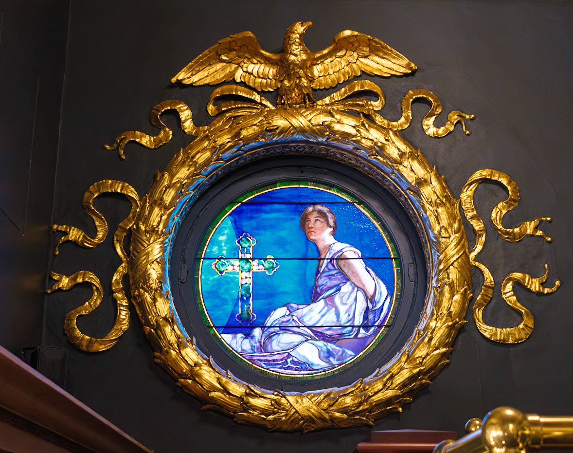 Woman and Cross Window in PA House Visitor Gallery