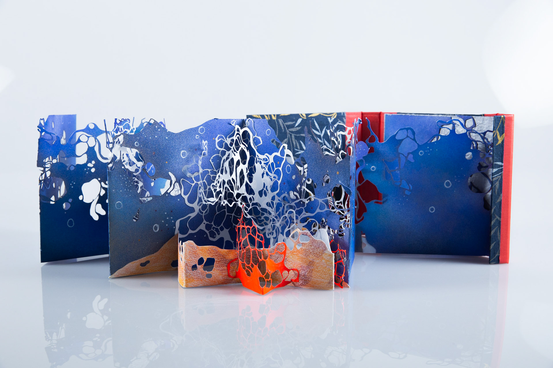 Wonders Down Unda Back View Opened, paper, embroidery floss, binders board, 4” x 4 7/8” x 1 9/32” (closed), 2022