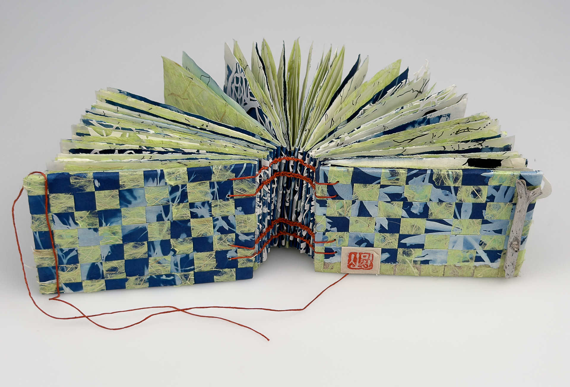 Blueprints of the Valley, Coptic Stitched book, cyanotype, tracing paper, ink, Korean paper, waxed thread, 3.25 x5 x 2.25 inches, 2026