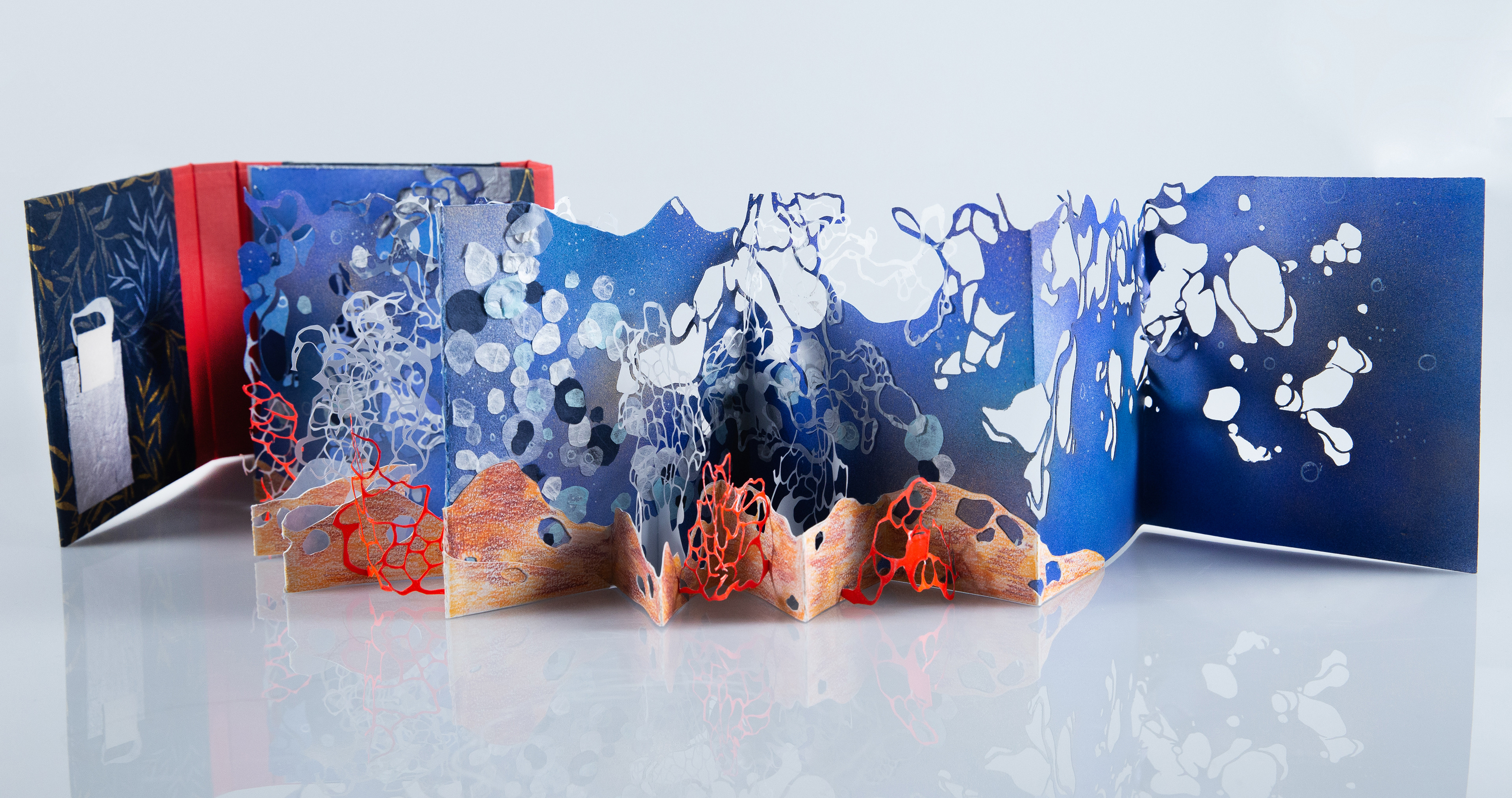 Wonders Down Unda Back View Opened, paper, embroidery floss, binders board, 4” x 4 7/8” x 1 9/32” (closed), 2022