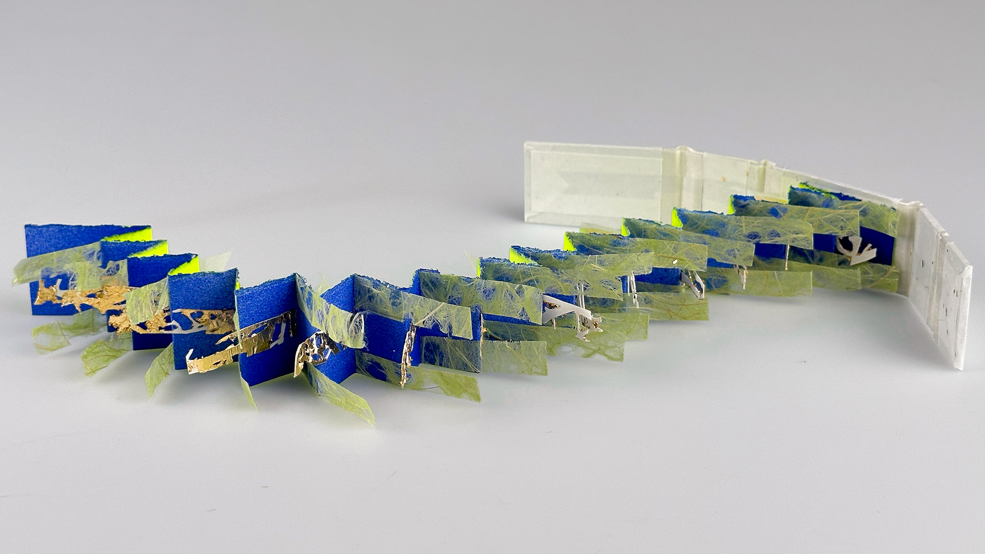 Tide’s Embrace, hand-cut paper, binders board, book cloth, lace paper, cellophane 14.5 inches x 2.75 inches x 1.5 inches (opened), 2024