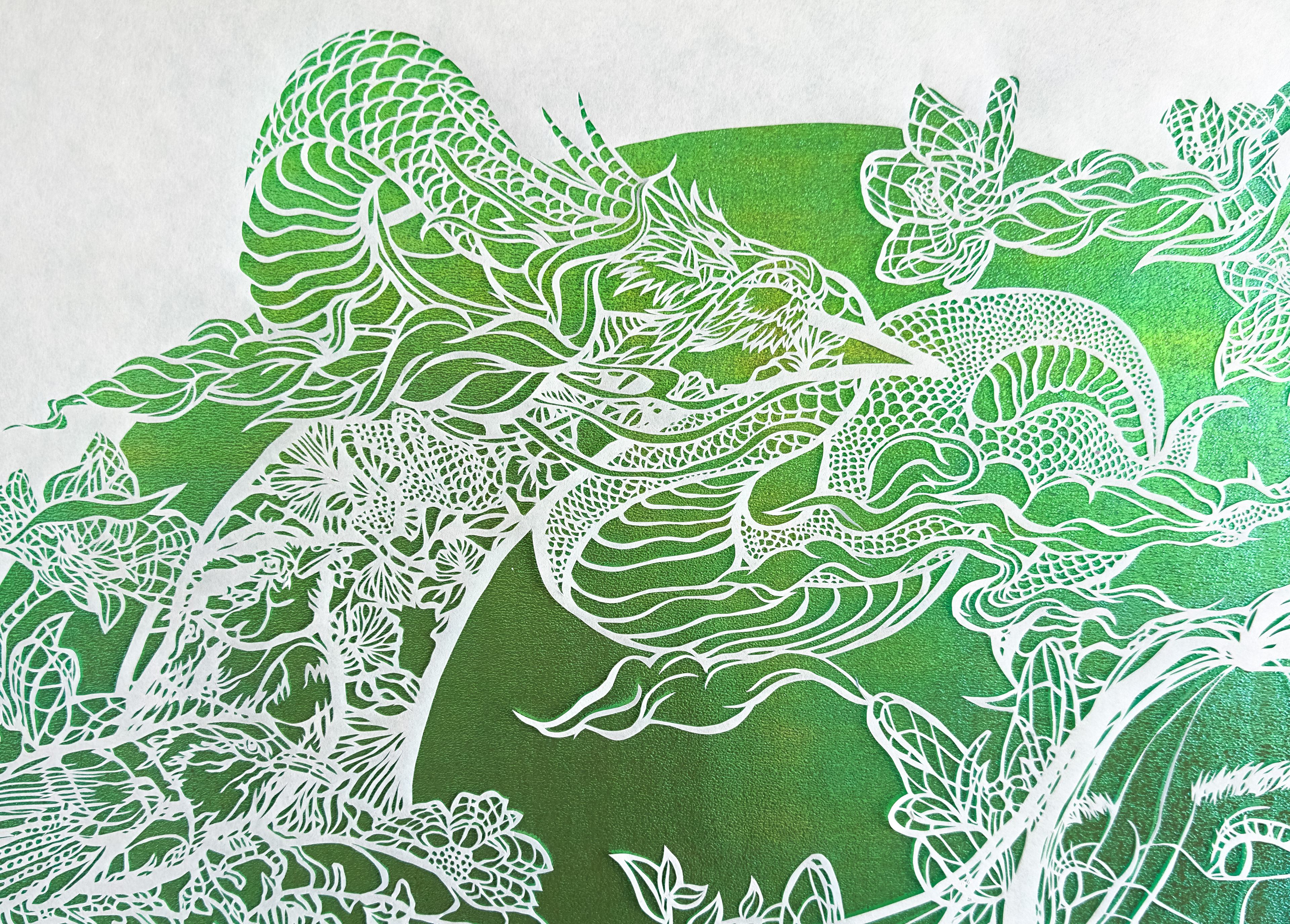 MeSun and the Imoogi’s Sky (Detail) , hand cut Kozo on iridescent paper, 40 x 40 inches, 2025