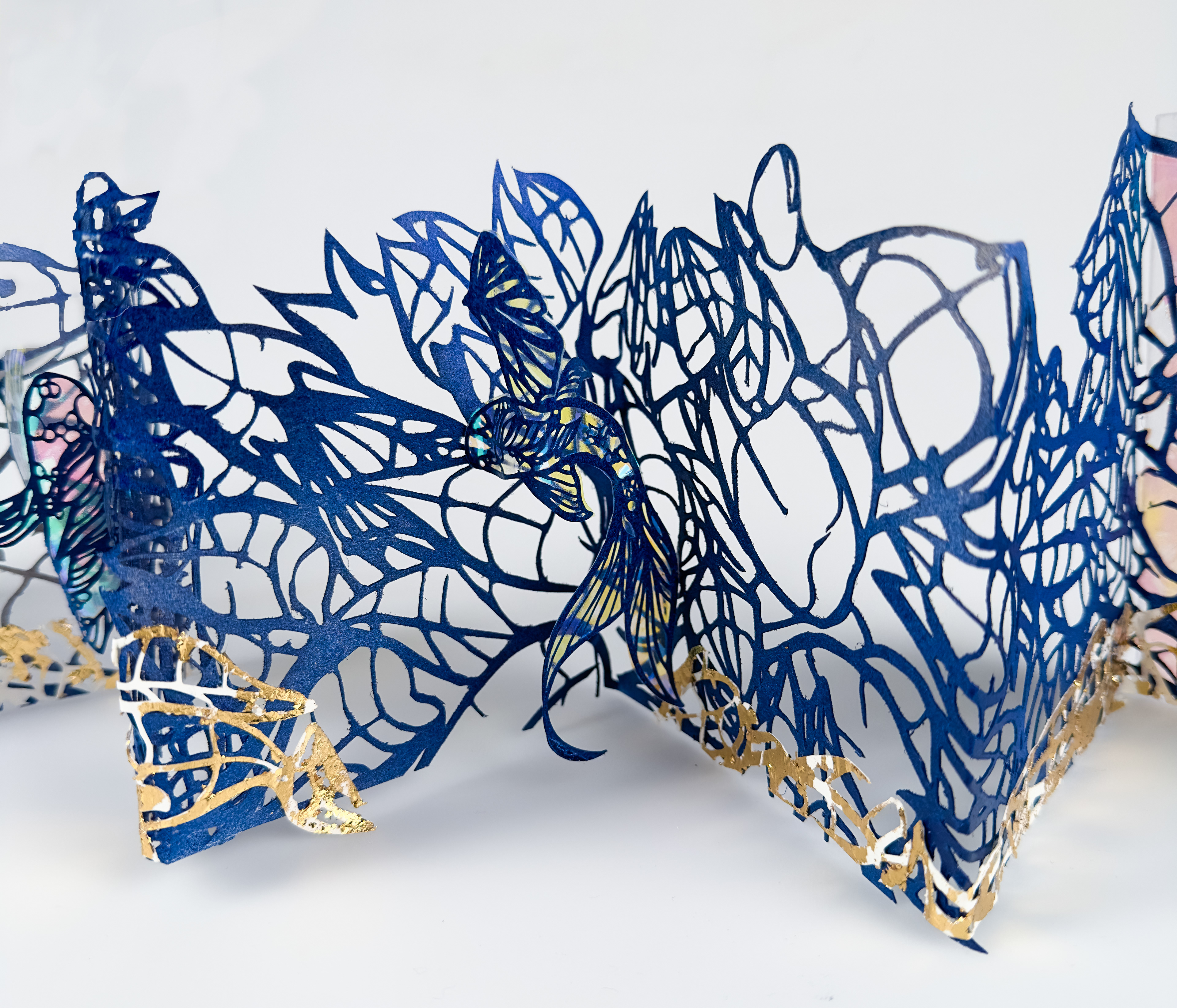 Hidden Upstream, hand cut paper, acrylic, cellophane, 31 x 6 x 5.5 inches,2025