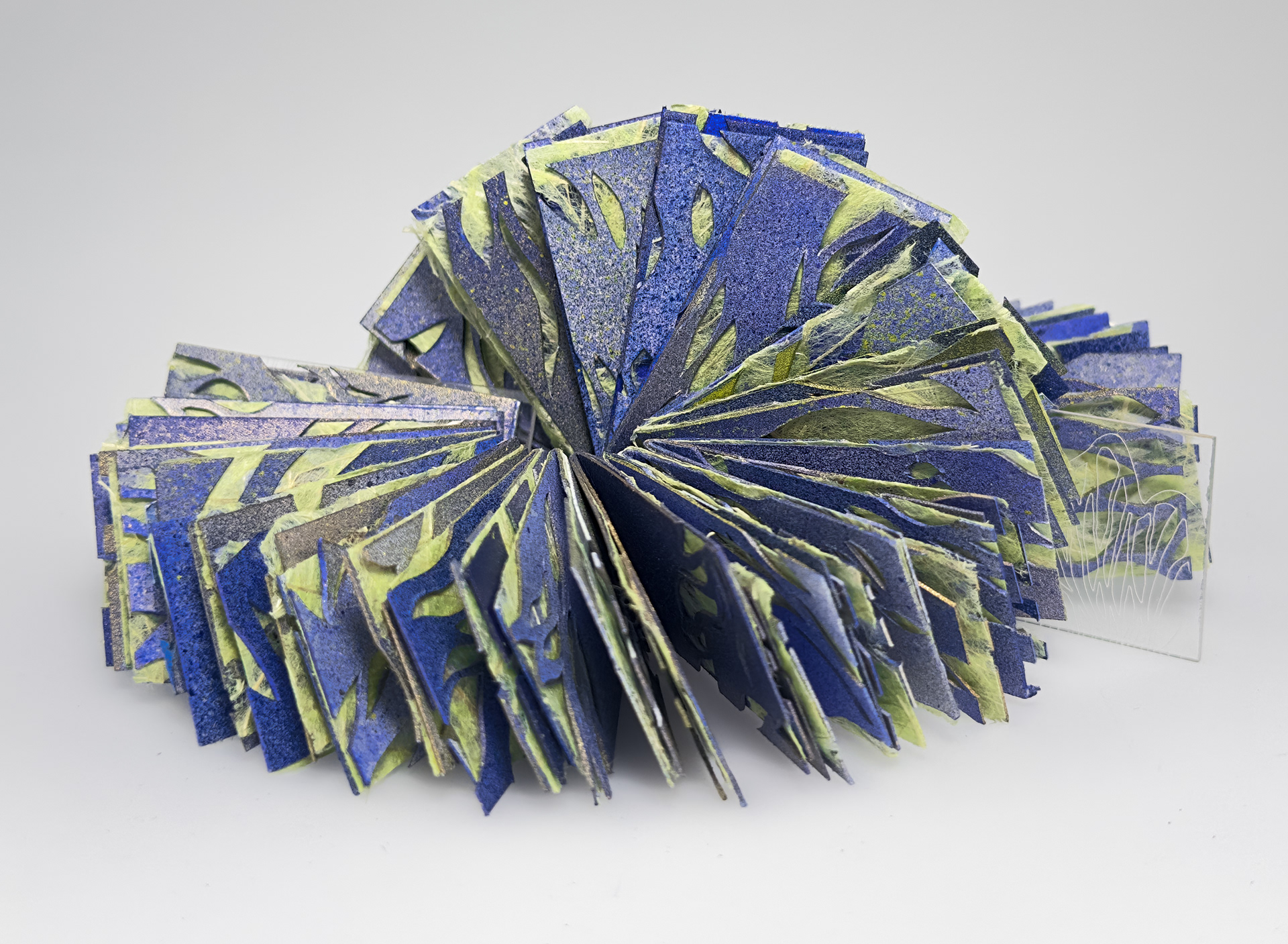 Undercurrents, paper, acrylic, waxed thread, 7 3/4 x 2 x 1 inches