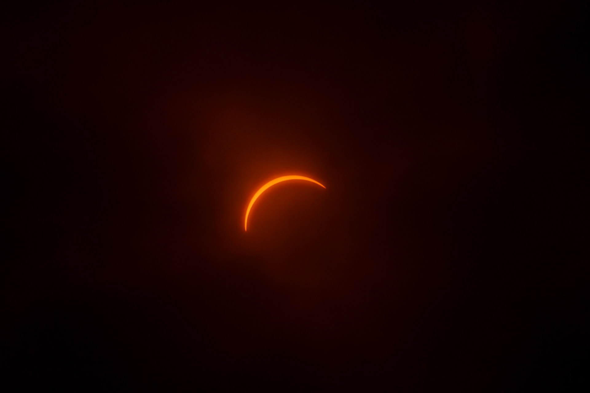 Partial Eclipse visible through clouds during the 2024 Total Solar Eclipse