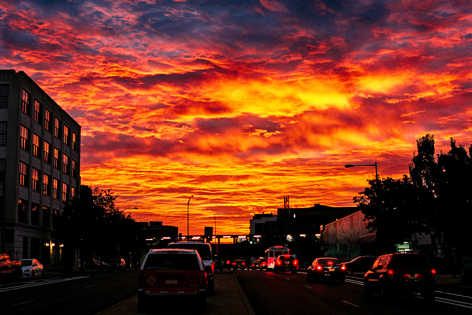 Red sky at dawn -3rd and SpringGarden. Image Capture: Nikon F100 35mm SLR w/50mm f/1.4 AFD lensKodak Portra400 35mm FilmExposure 1/60sec f/4 pulled to ISO 200Developed and digitized by Indie Photo Lab.