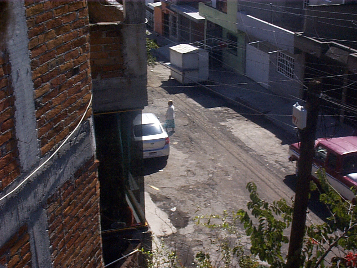 Abuelita walking outside of her house