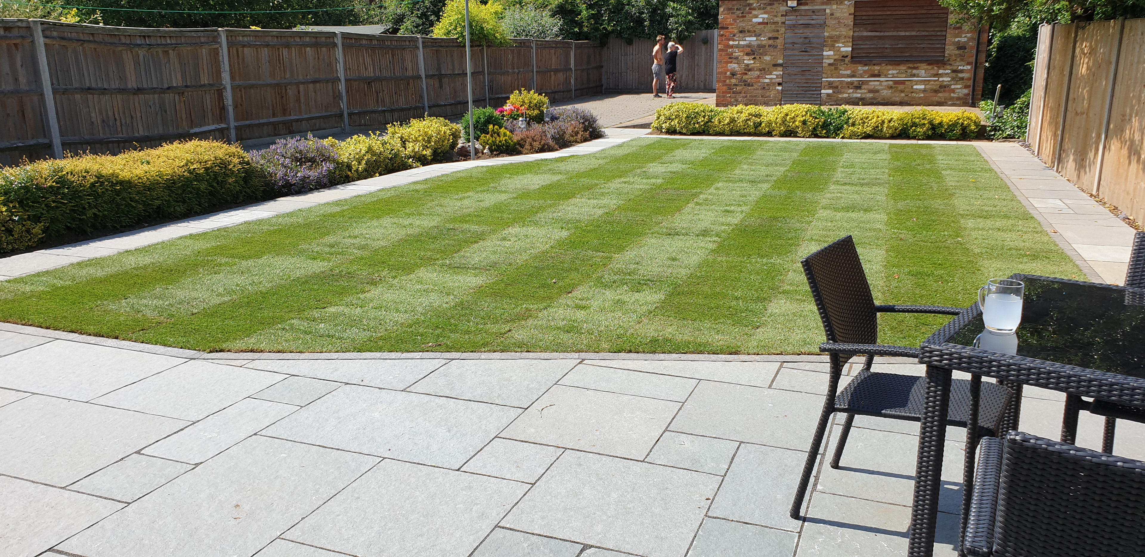Blue Limestone Paving with a Fresh New Lawn