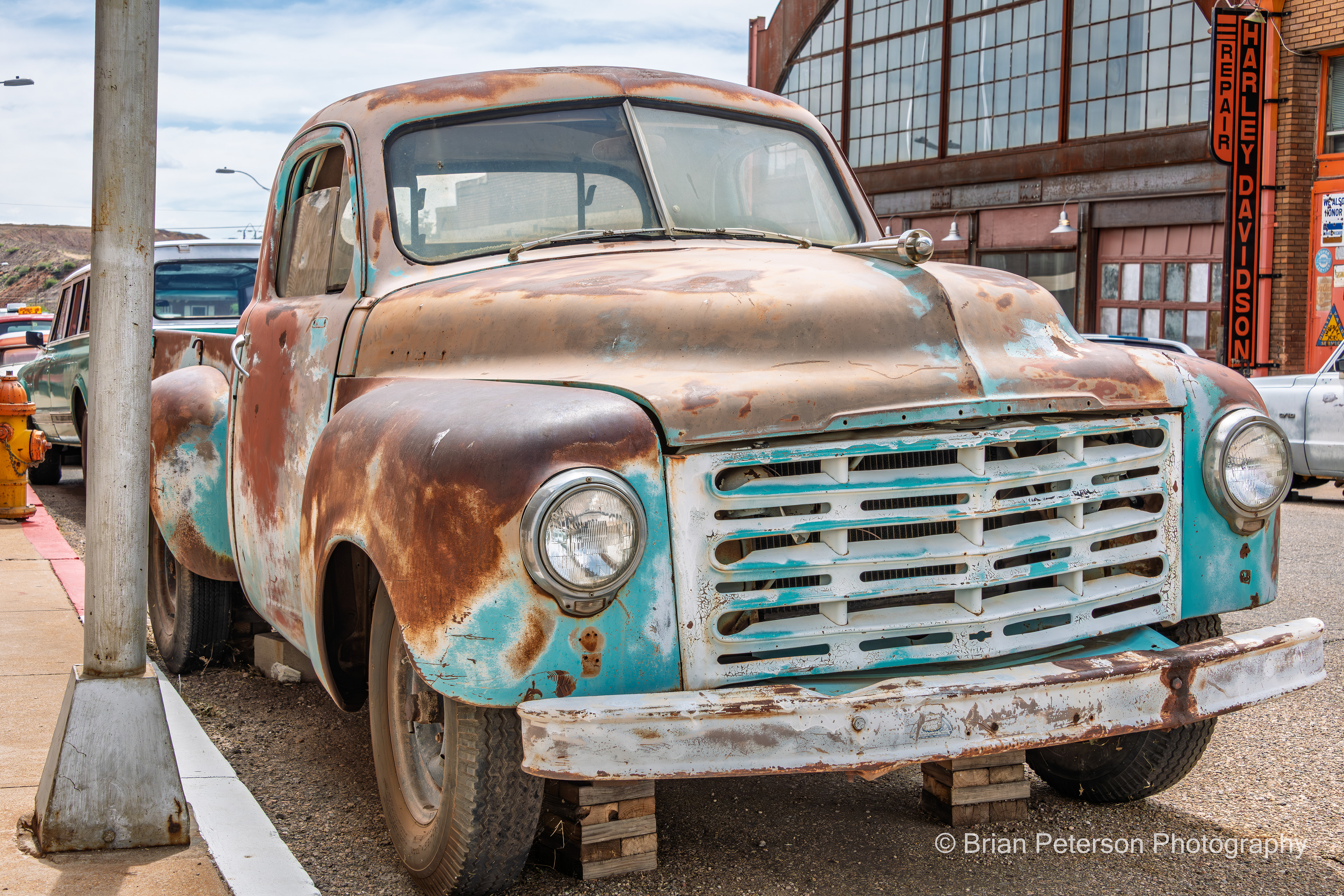 Front side of the old rusty Ford truck