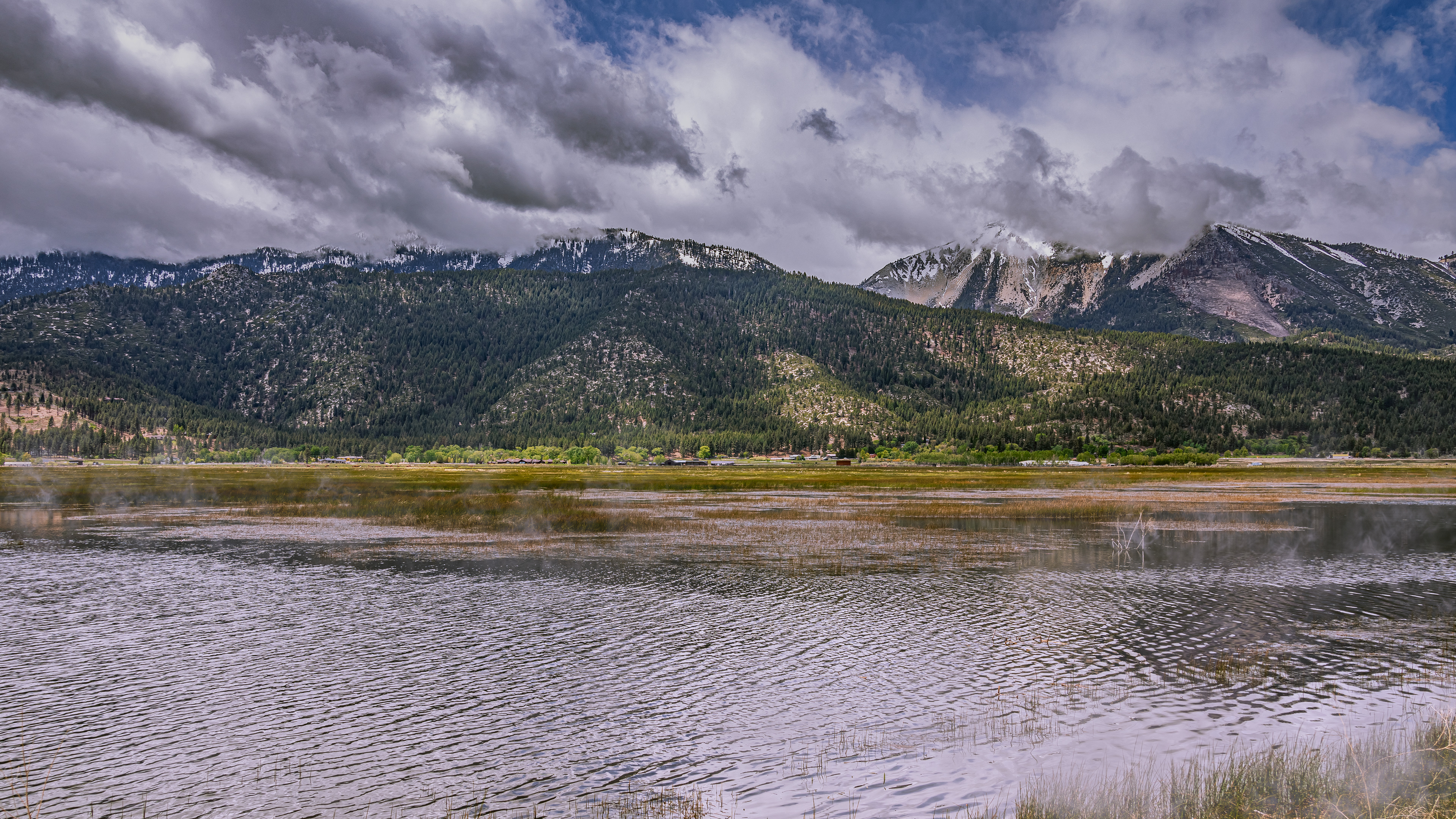 Slide Mountain with cloud cover, and Washoe Lake in the foreground.