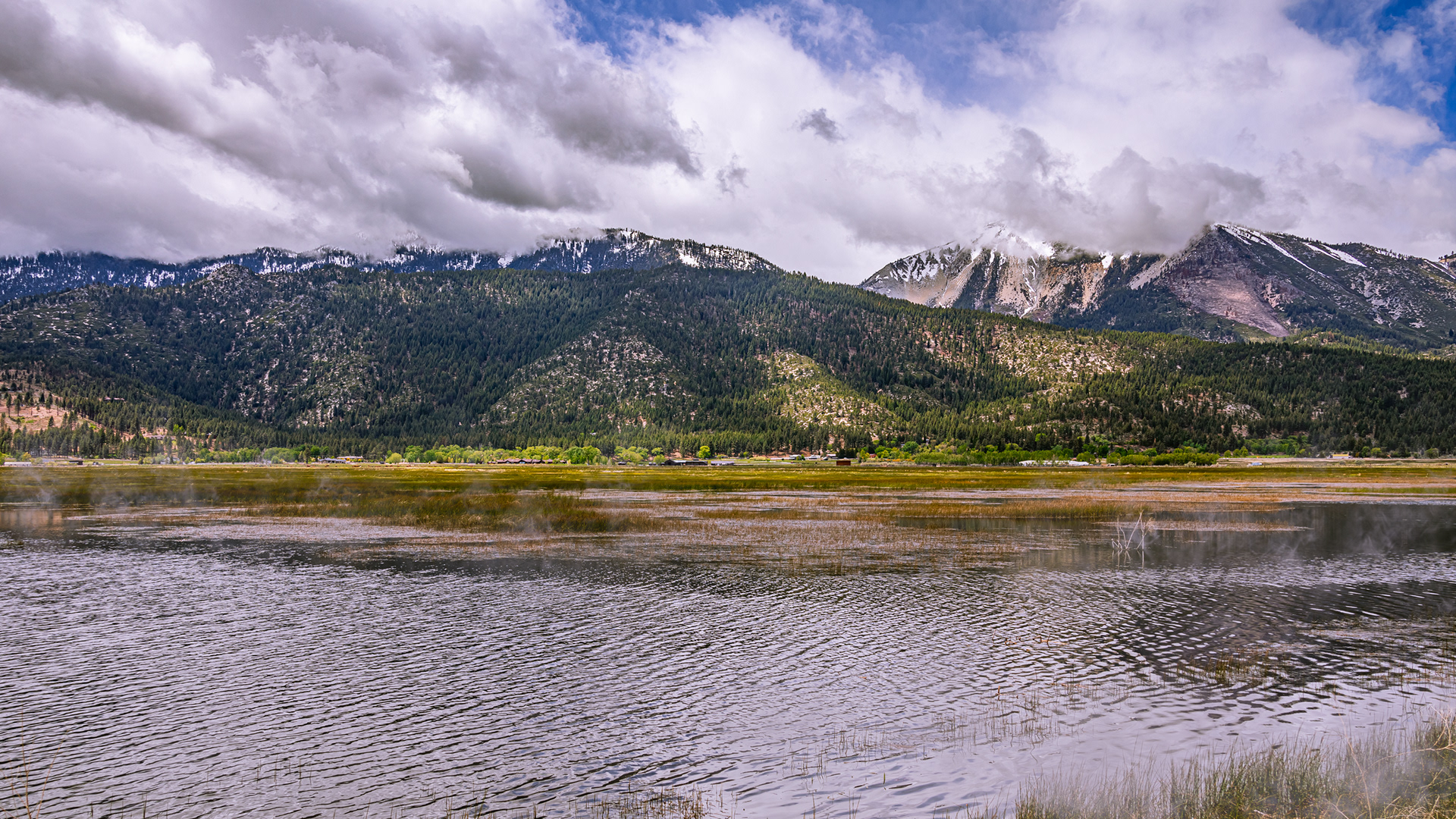 Slide Mountain with cloud cover, and Washoe Lake in the foreground.