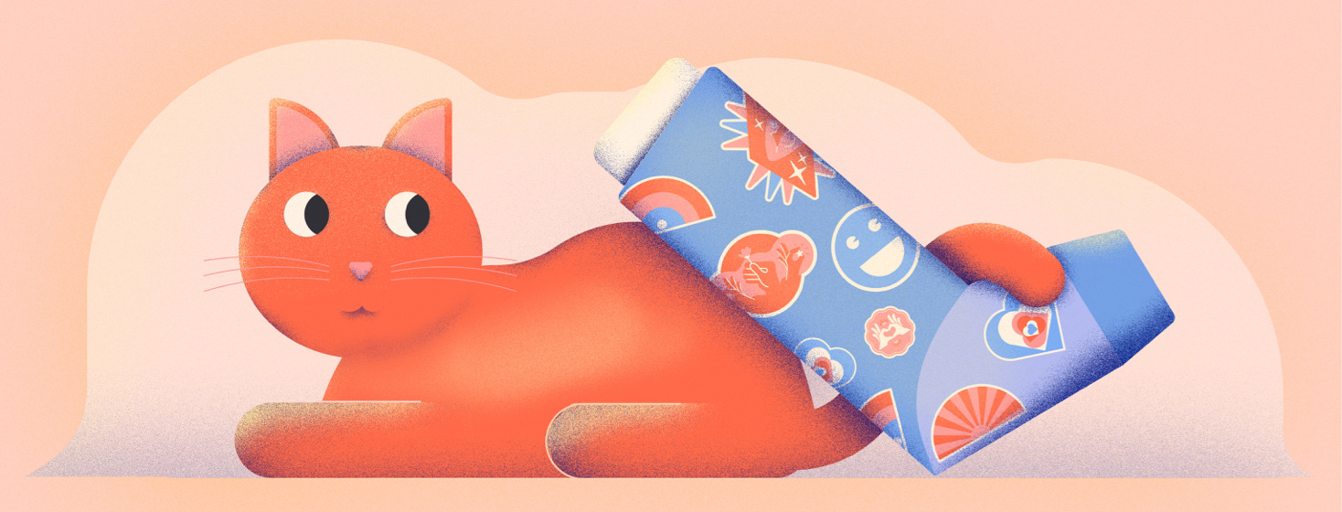 A cat with its tail wrapped around an inhaler