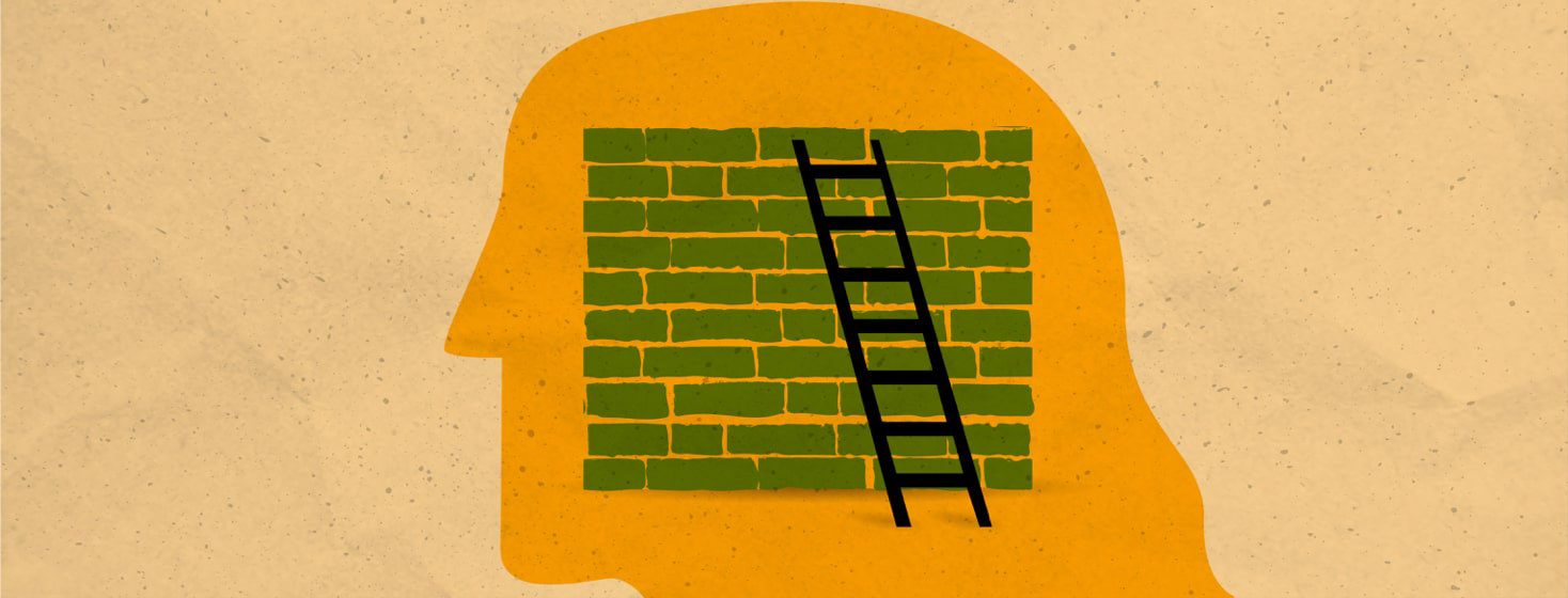 a ladder leaning against a brick wall in the silhouette of a persons head