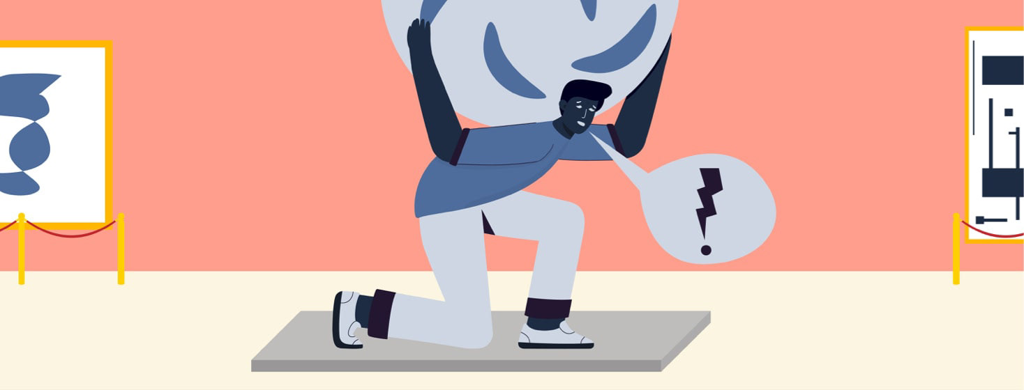a male statue holding up a boulder with sickle cells on it while in pain