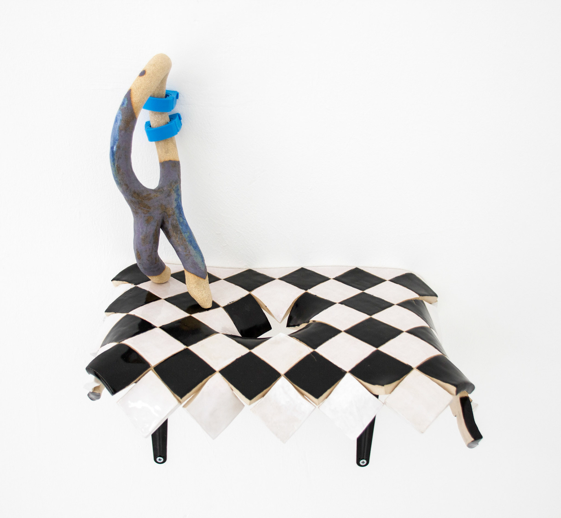 'Rupture (tentative)',  glazed stoneware, pipe holder clips, brackets,  60 x 47 x 30