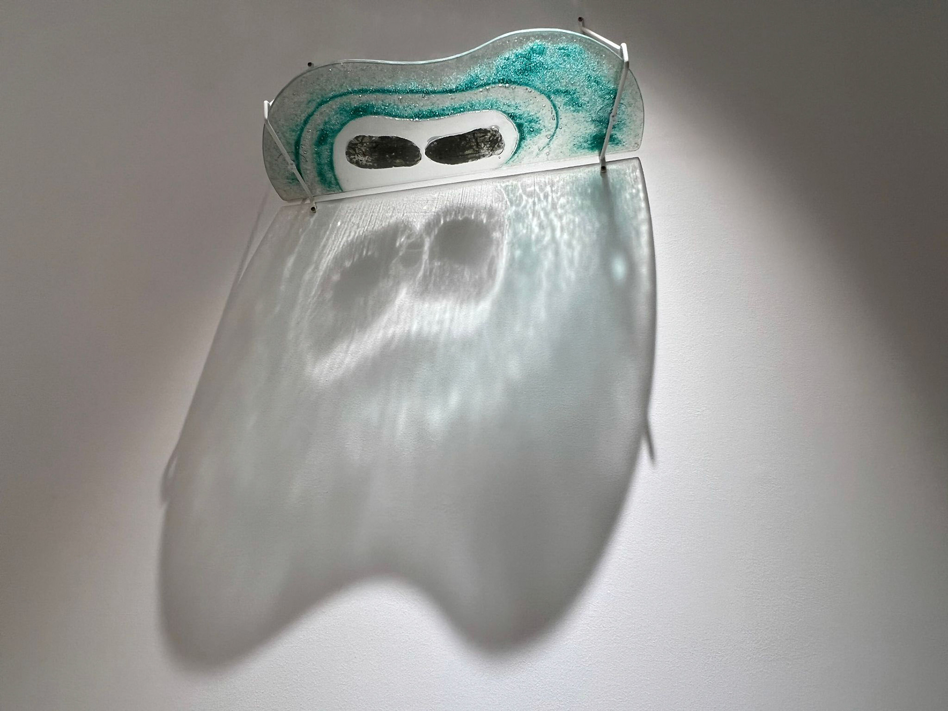 'You see right through me – Cell of Air', powder-coated metal brackets, glass, metal inclusions  