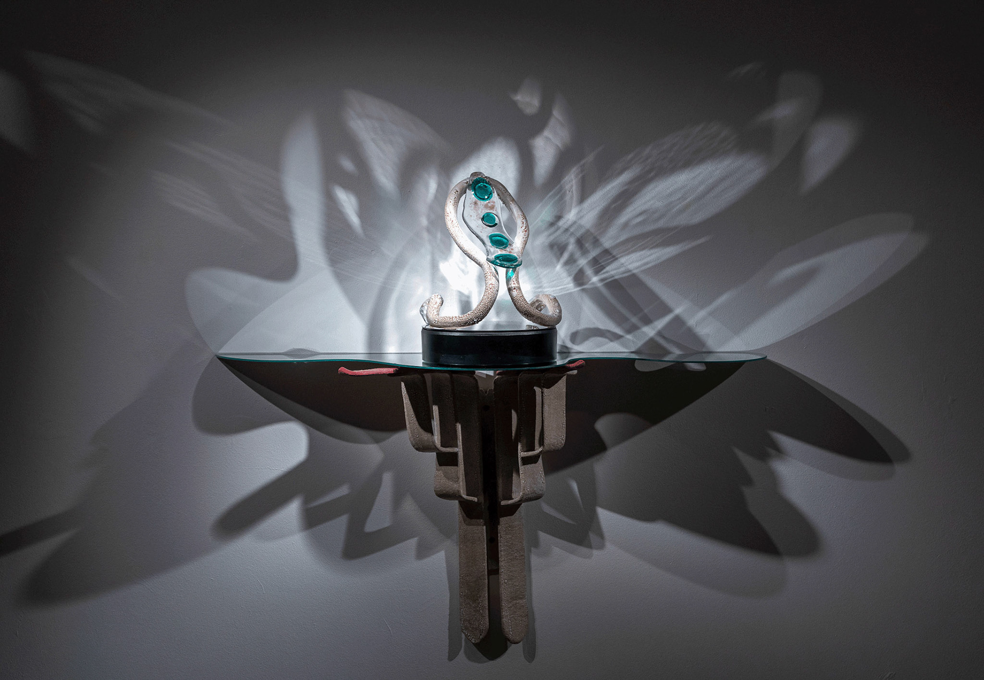  'On the tip of my Tongue,' glazed stoneware bracket, mirror, rotary platform, glass