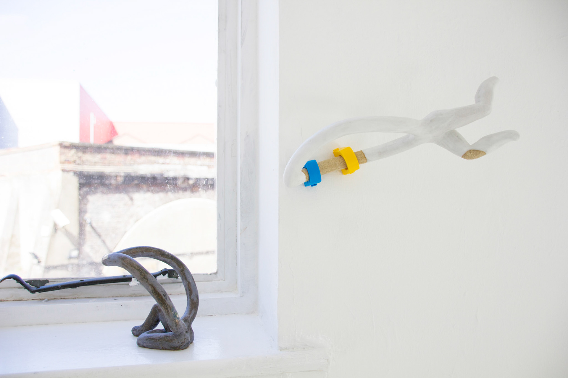 'Deep Dive',  glazed stoneware, pipe holder clips,  26 x 50 x 16cm