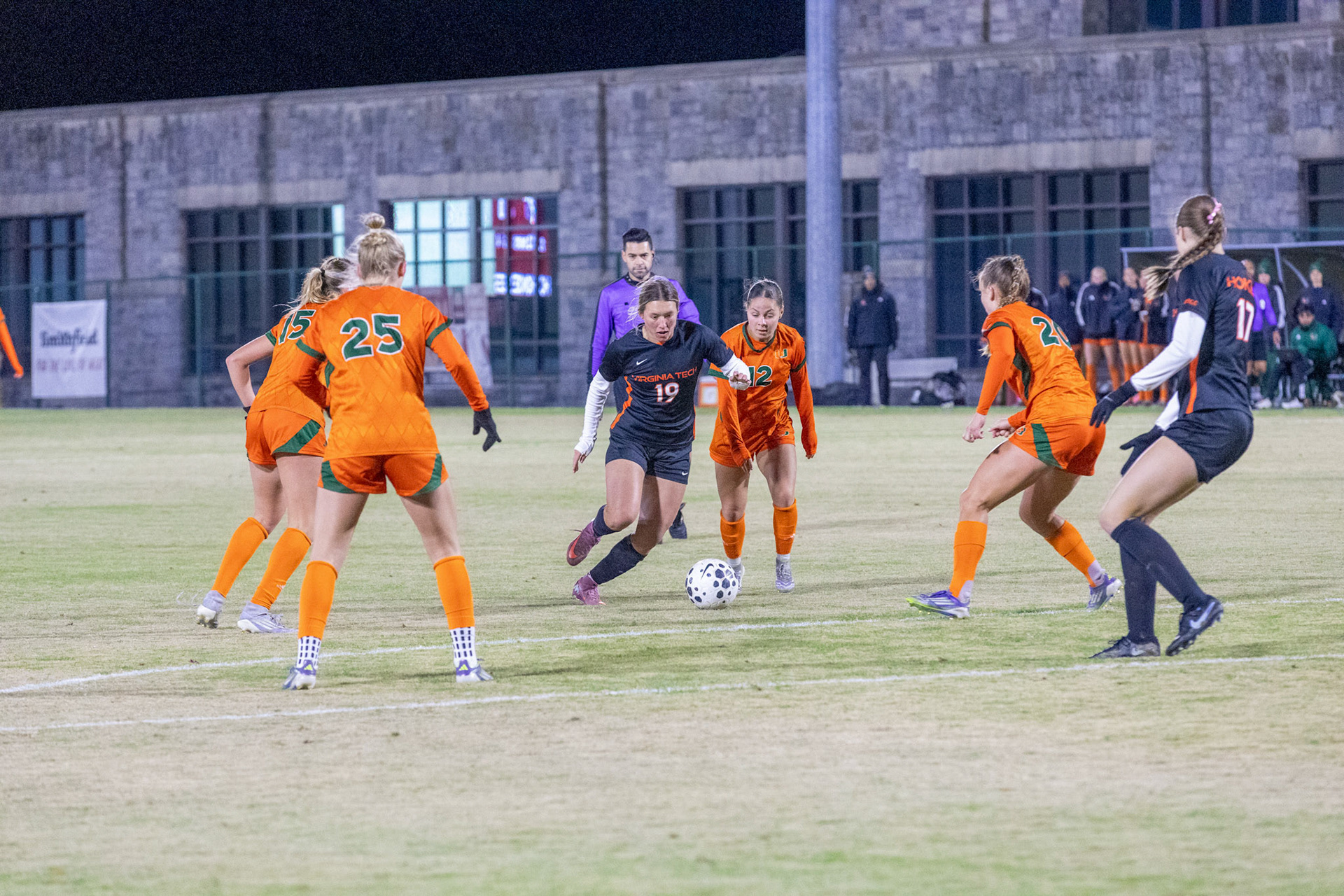 Virginia Tech forward Samantha DeGuzman (19) maintains control under pressure