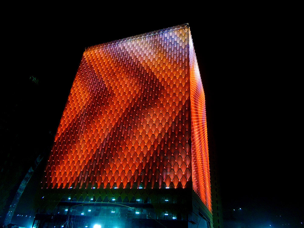 A side view of a tower on-site in Saudi Arabia. Artwork by Ria Ama. (Photo: StandardVision)