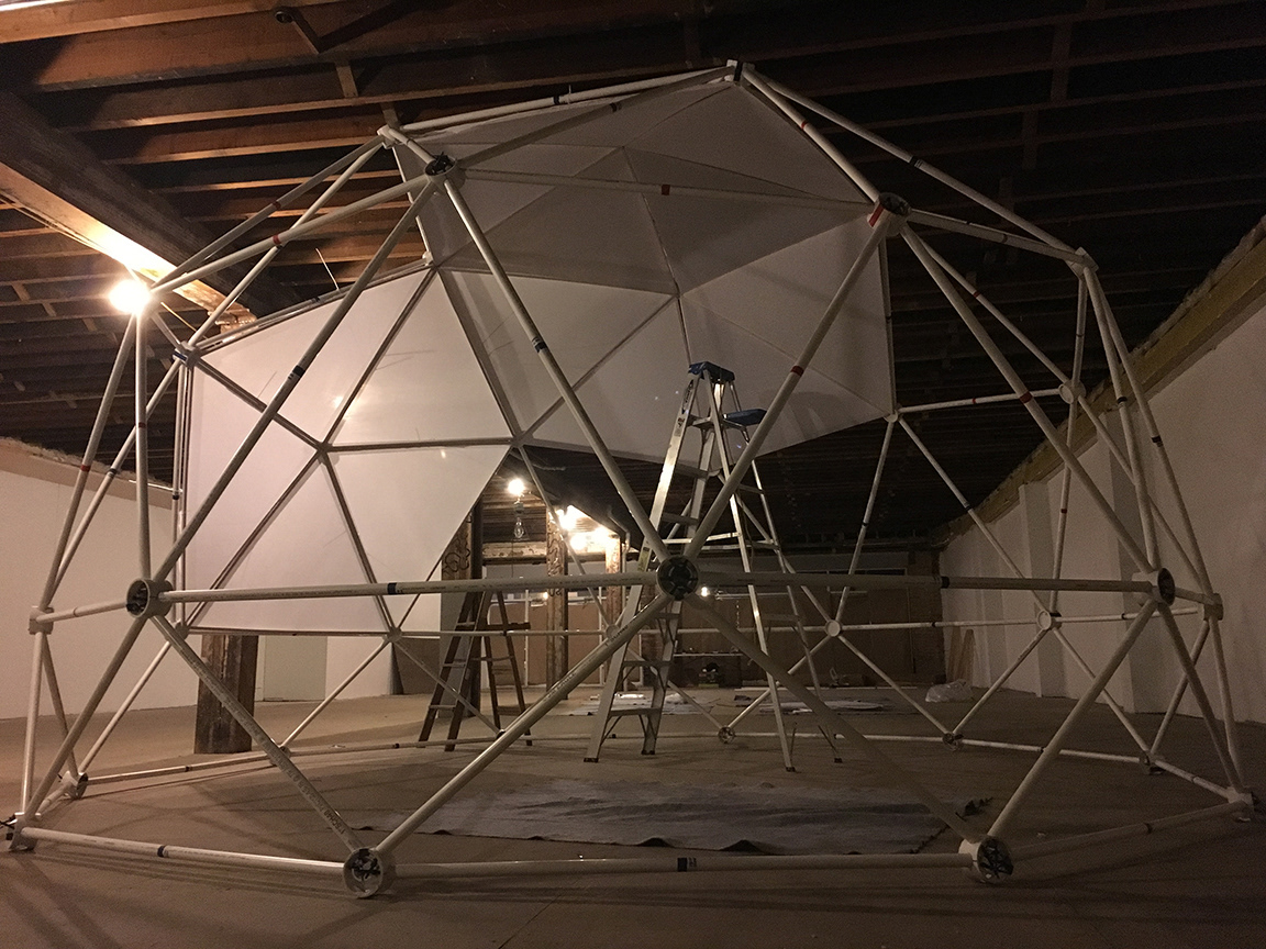 Fabric panels were secured to the frame of the dome for video projection